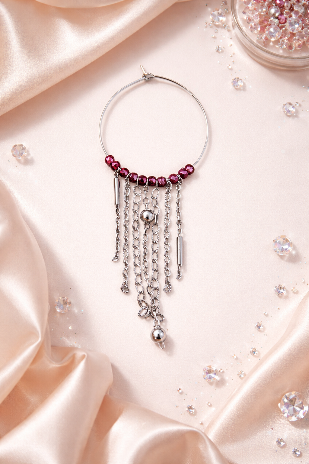 Mono orecchino in acciaio e zirconi bordeaux firmato Vizio Gioielli