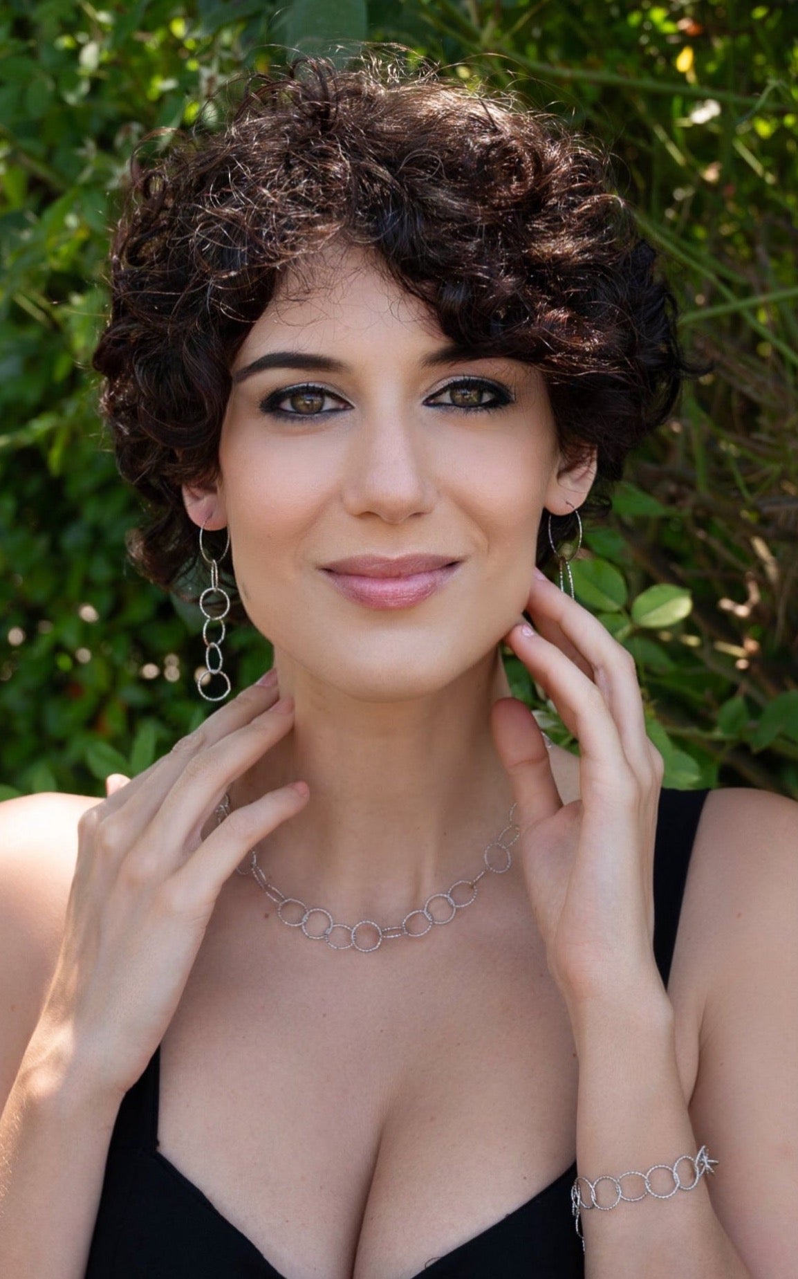 Collana, bracciale e orecchini in acciaio