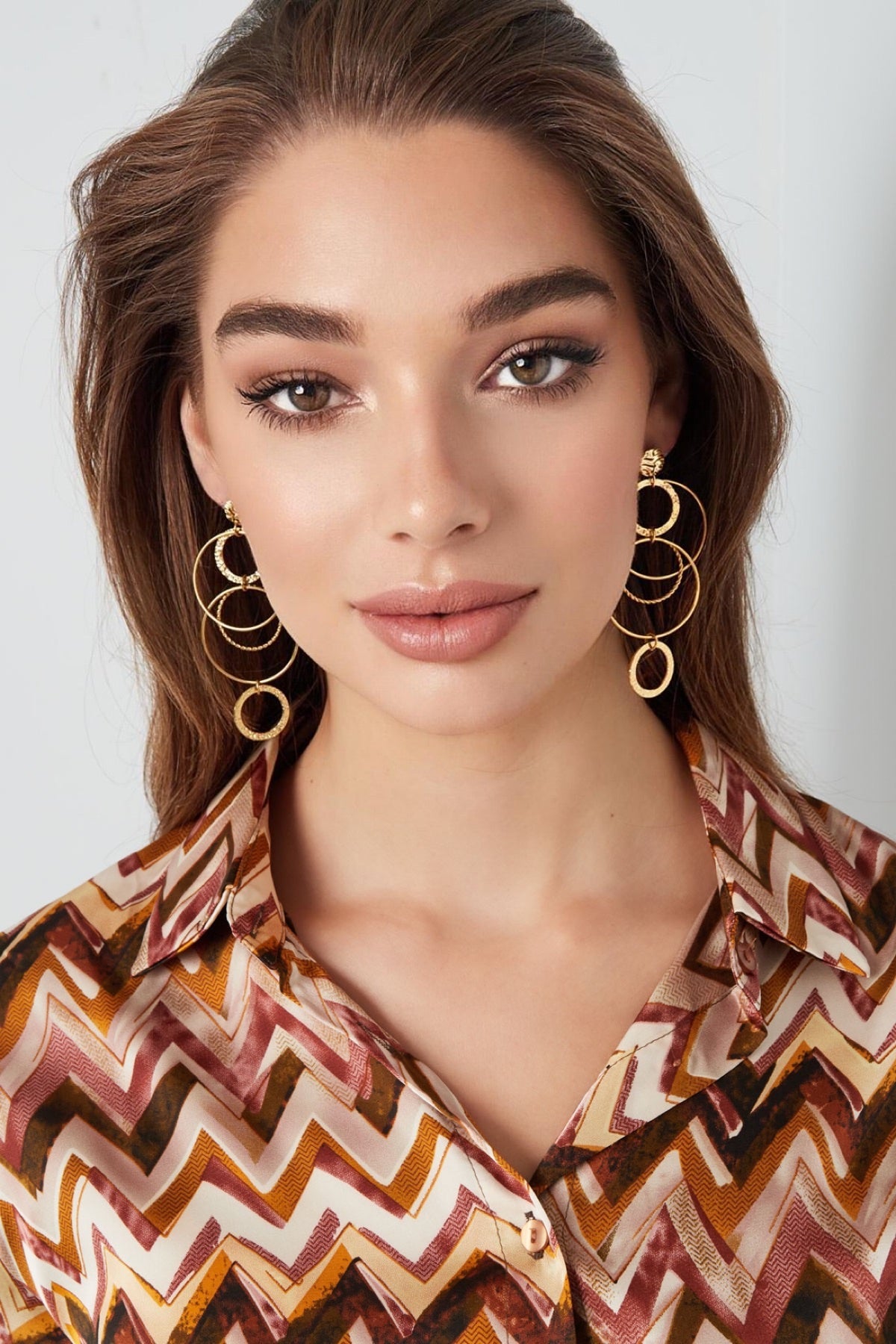 Orecchini in acciaio dorato