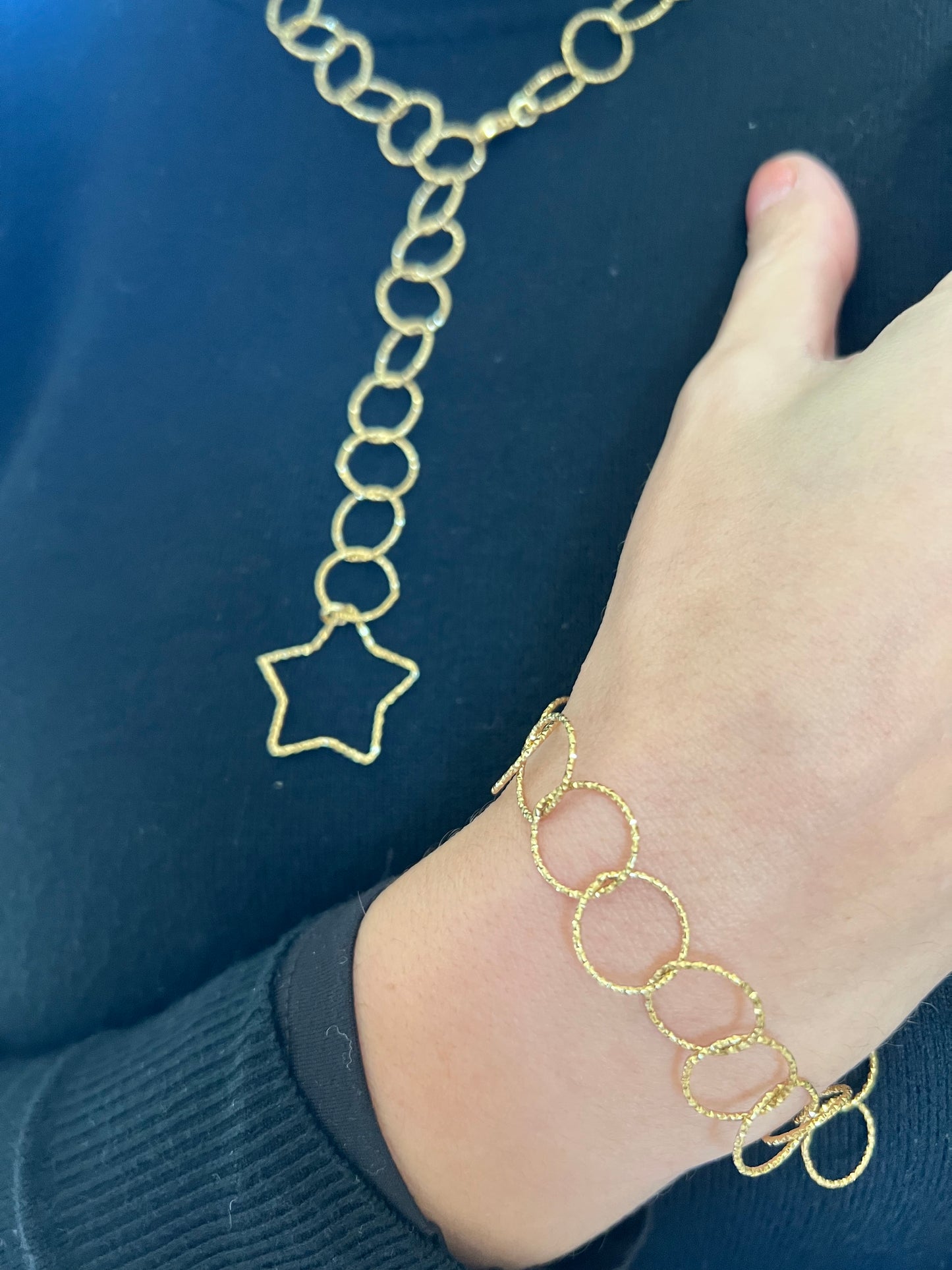 Collana e bracciale in acciaio dorato