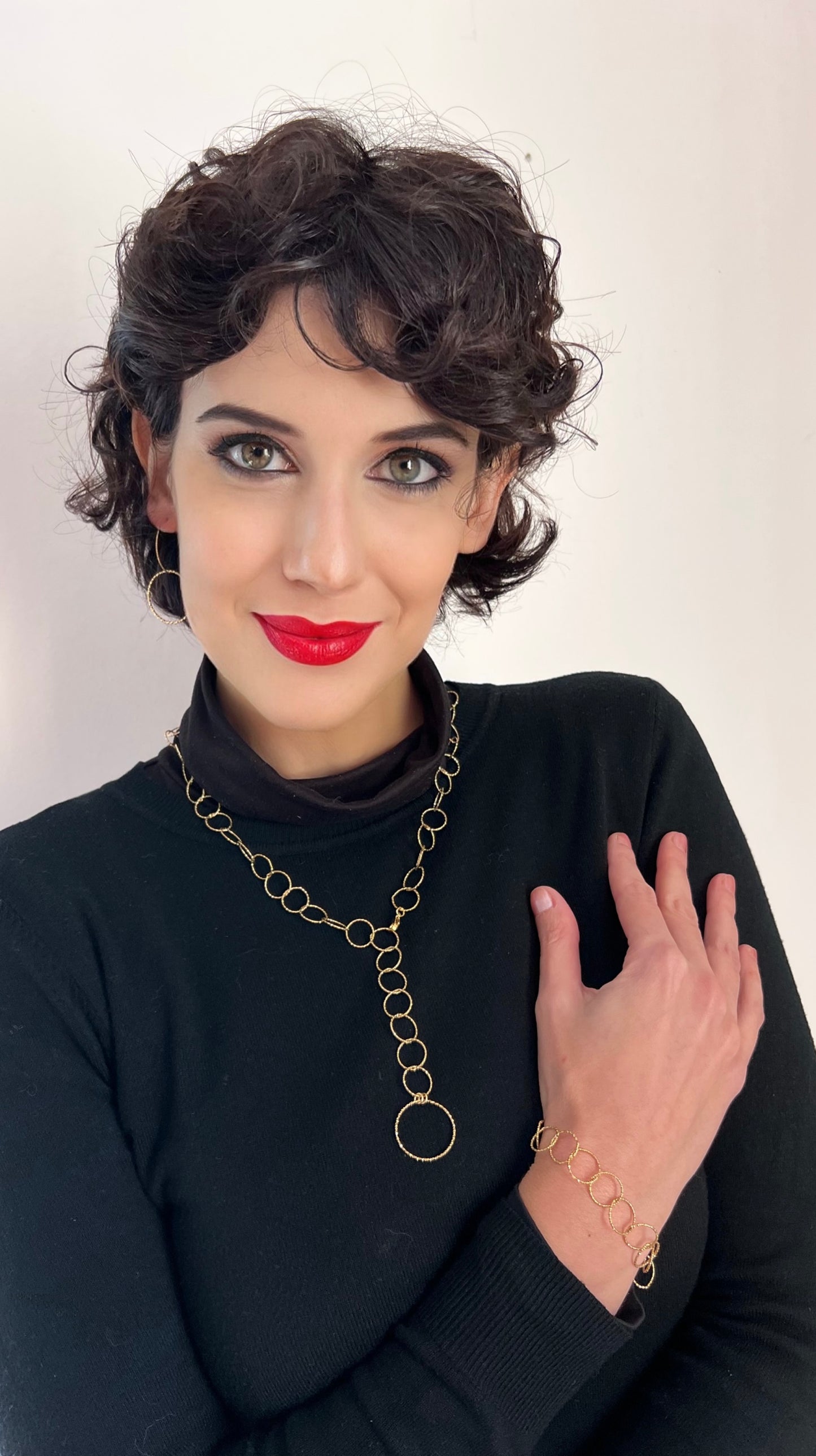 Orecchini e bracciale in acciaio