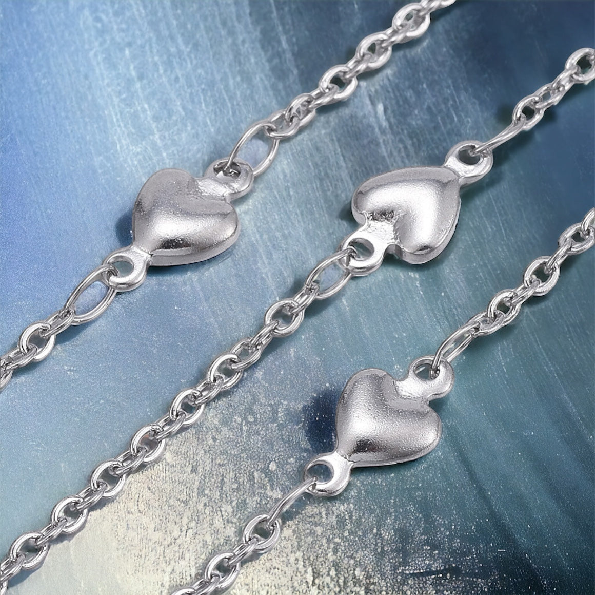 Collana lunga in acciaio cuoricini