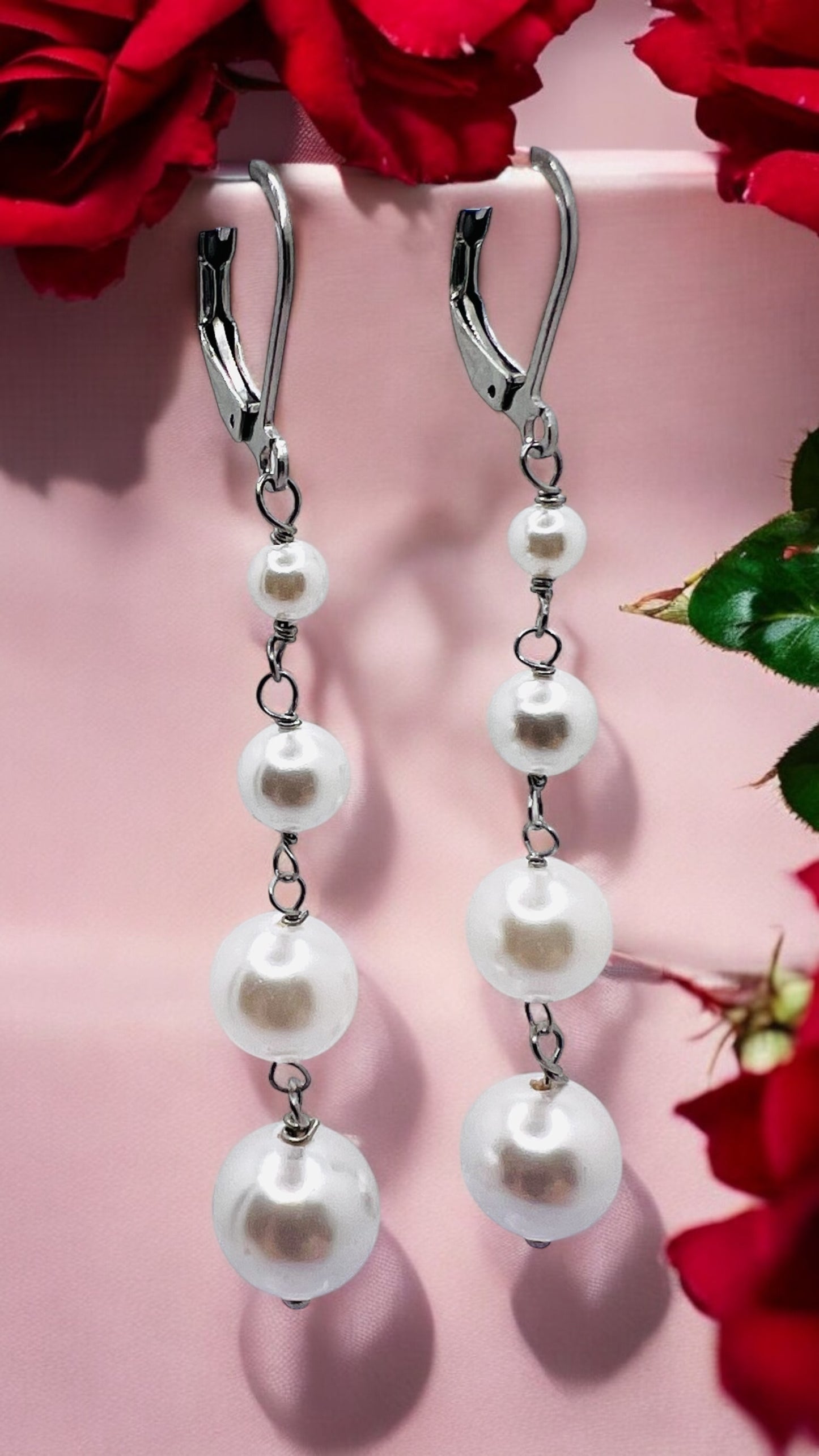 Orecchini in acciaio e perle di madreperla