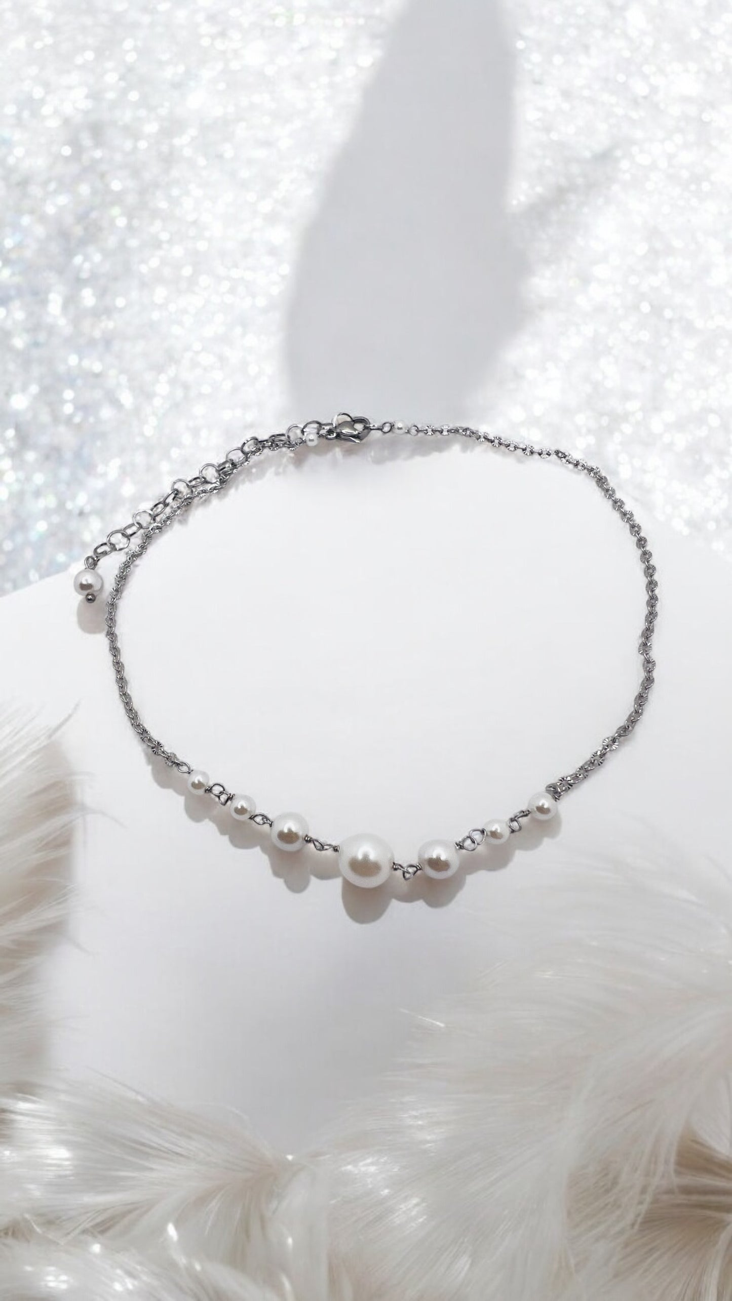 Choker in acciaio e perle di madreperla