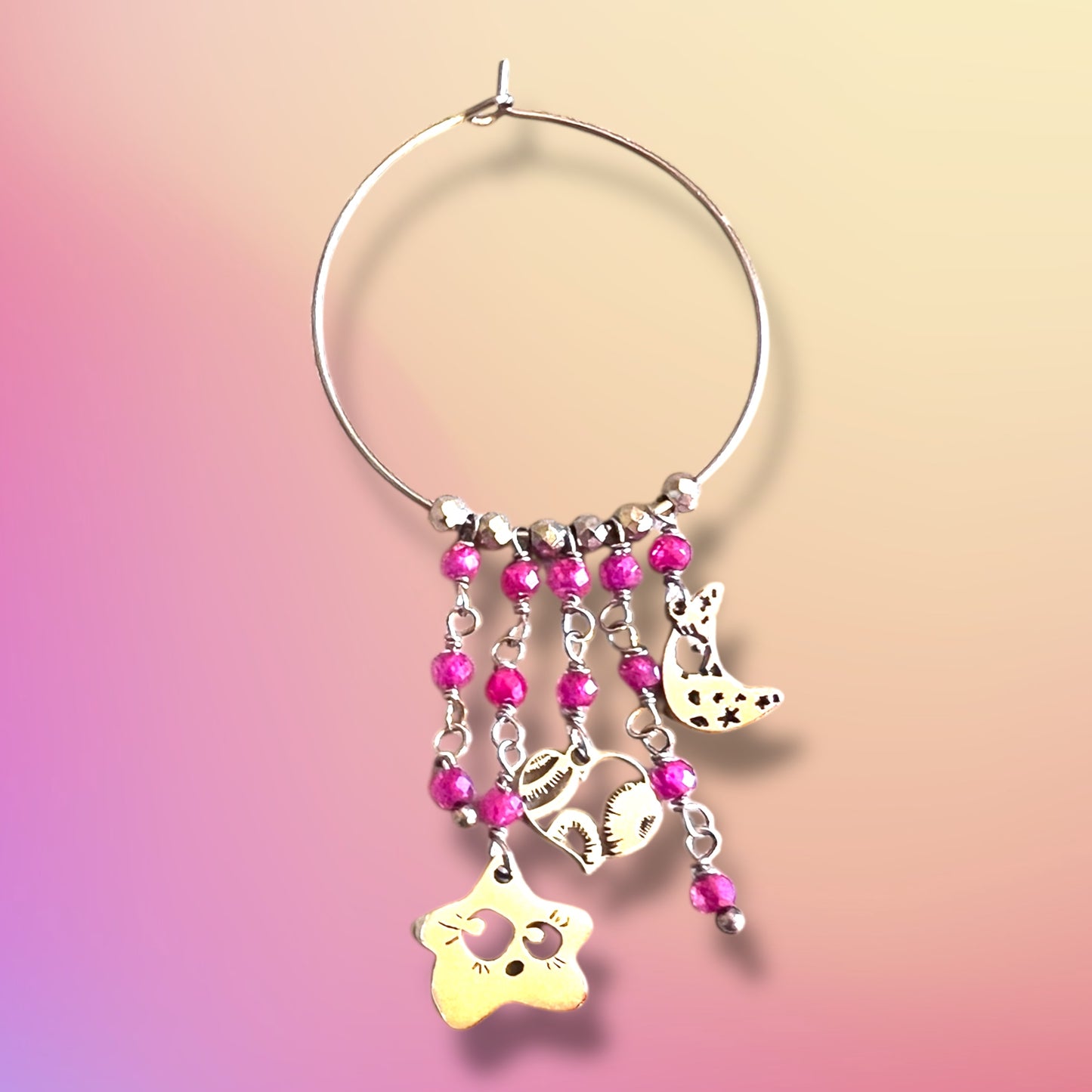 Mono orecchino in acciaio e zirconi