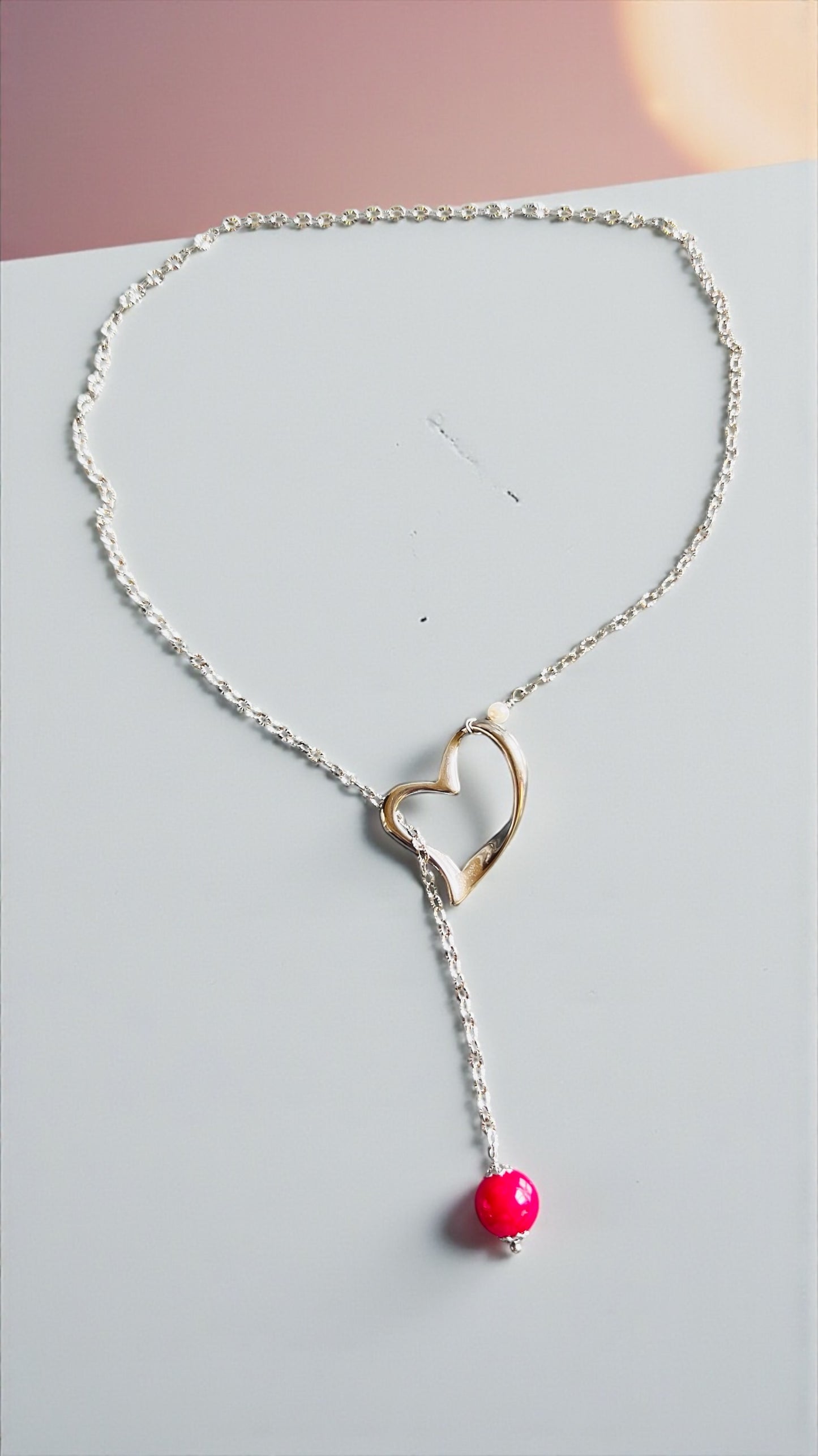 Collana sali-scendi Vizio in Paris in acciaio con rubino lab e perla di conchiglia