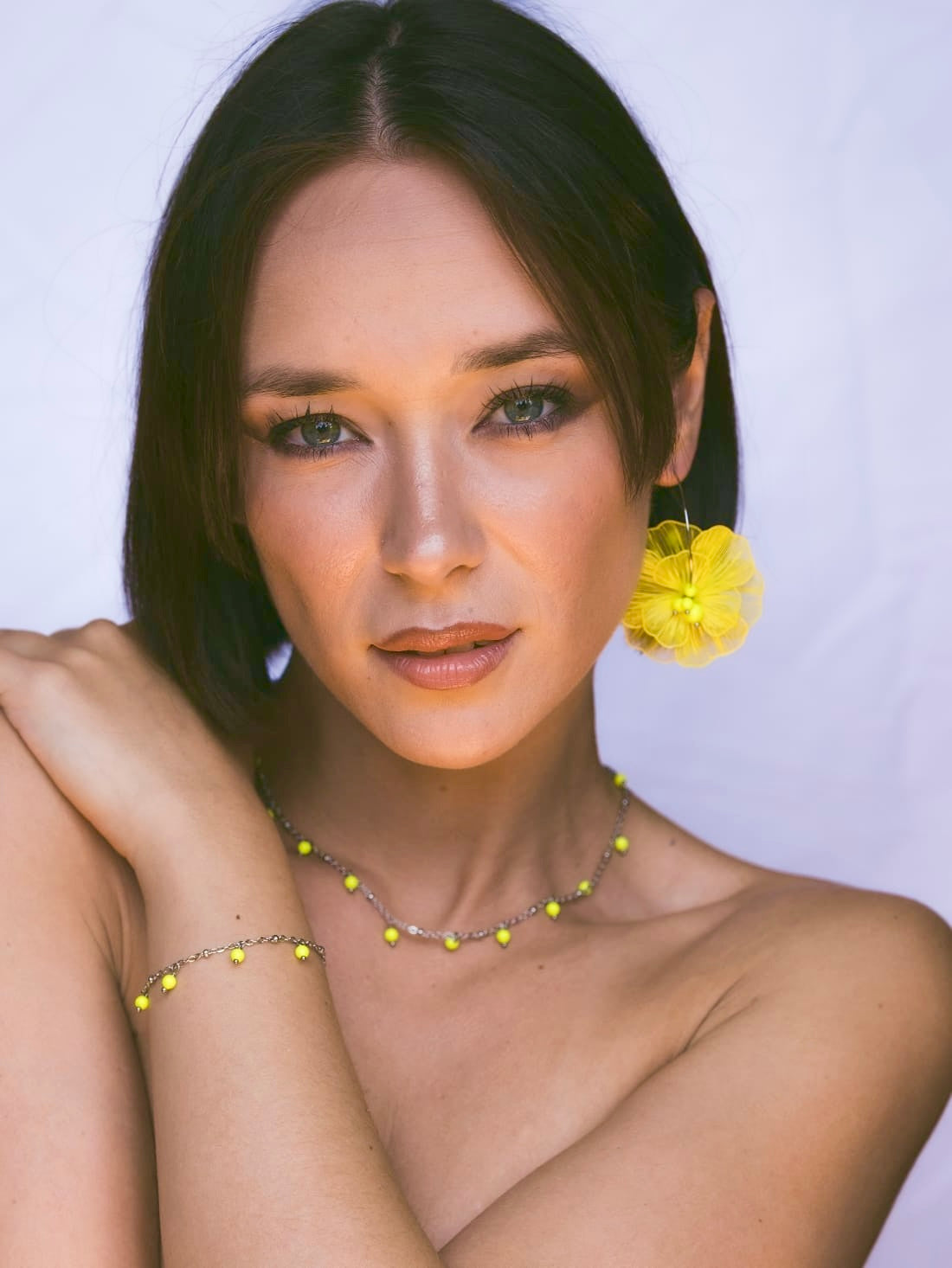 Mono orecchino, girocollo e bracciale  in acciaio e perle Swarovski 