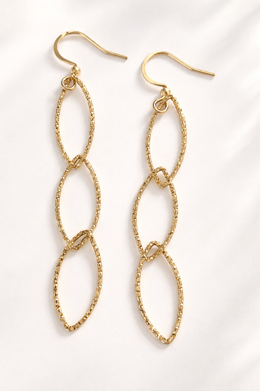 Orecchini in acciaio dorato firmati Vizio Gioielli