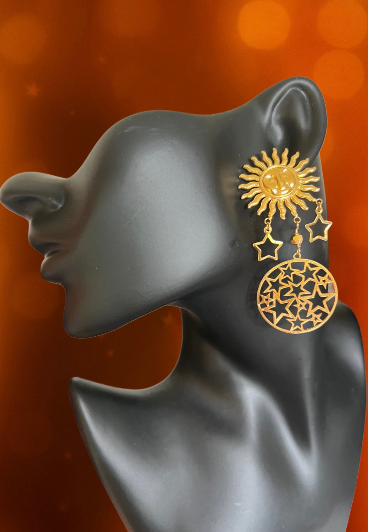 Mono orecchino in acciaio dorato