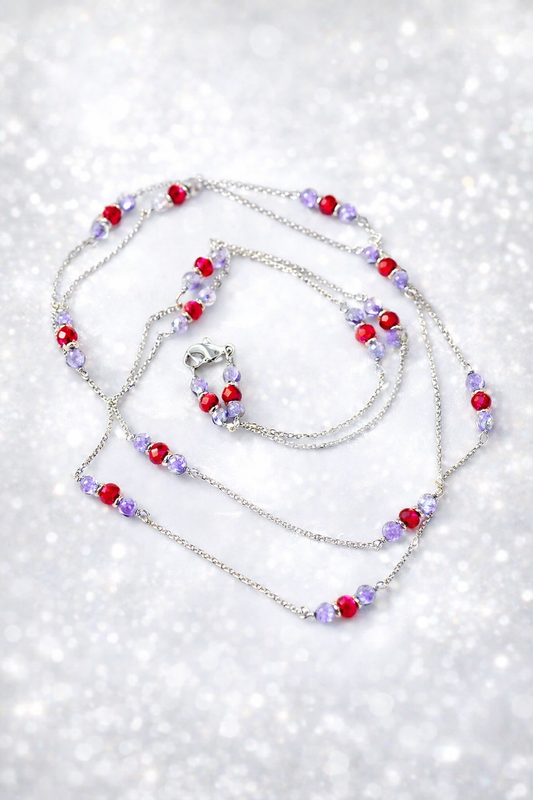 Collana in acciaio diamantato, tanzanite e corindoni rubini firmata Vizio Gioielli