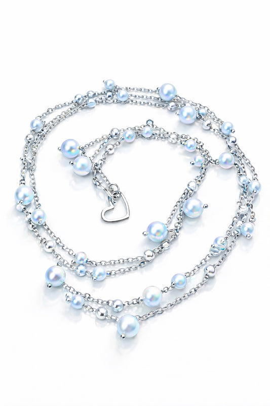 Collana in acciaio e perle Swarovski azzurre firmata Vizio Gioielli