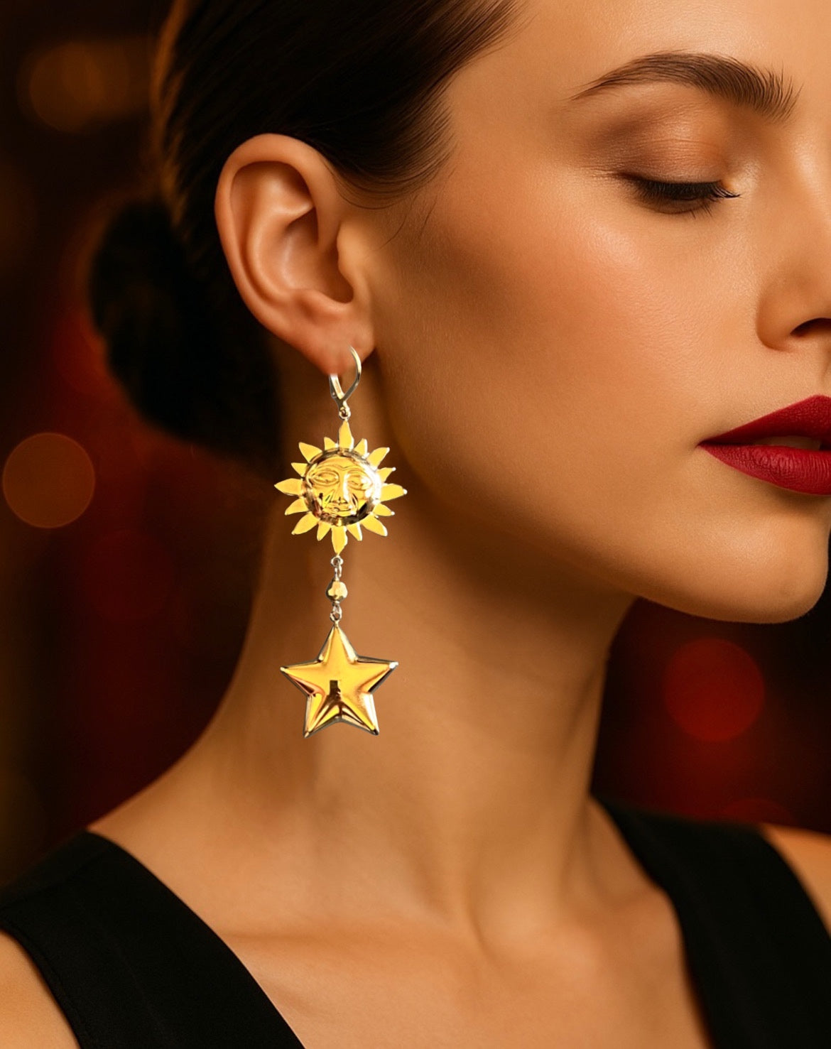 Mono orecchino in acciaio dorato