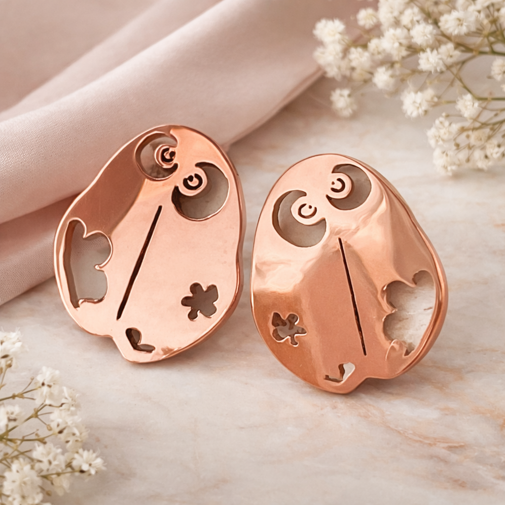 Orecchini a lobo in acciaio rosato Coccinelle Vizio Gioielli