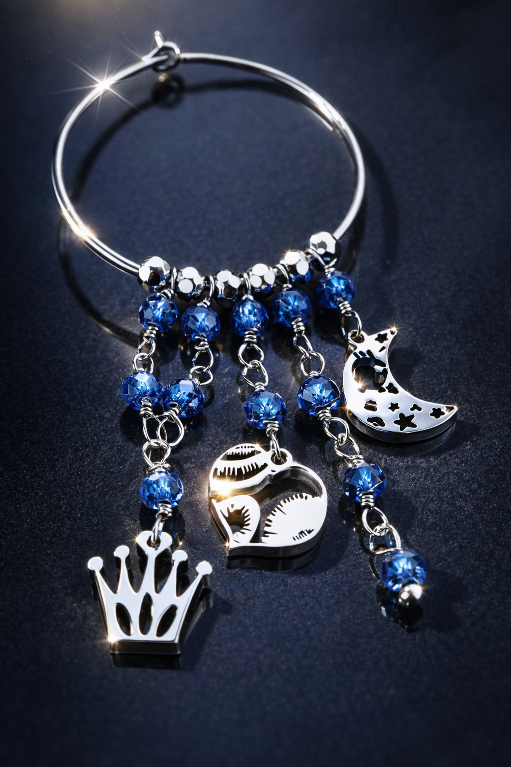 Mono Orecchino Maxi in Acciaio con Zirconi Blu e Pendenti Luna, Cuore e Corona firmato Vizio Gioielli