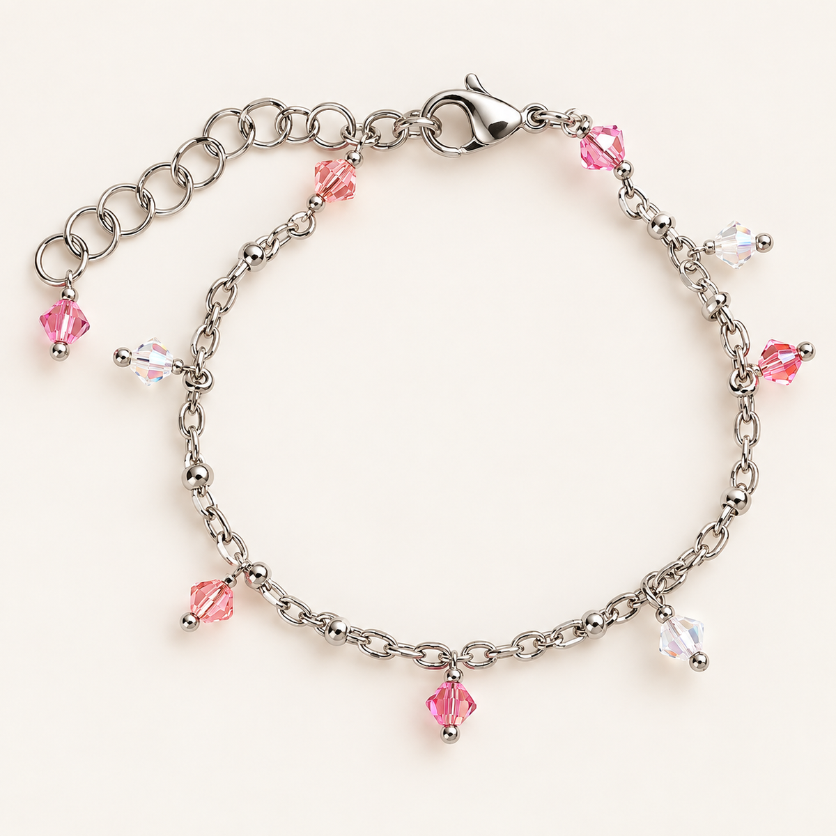 Bracciale California Sunrise in acciaio lucido con cristalli rosa pesca e trasparenti

