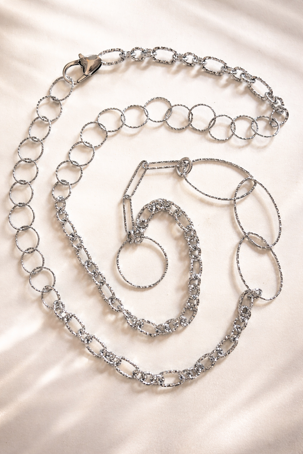 Collana Musa Trisversale – Collana lunga in acciaio con ciondoli agganciabili firmata Vizio Gioielli