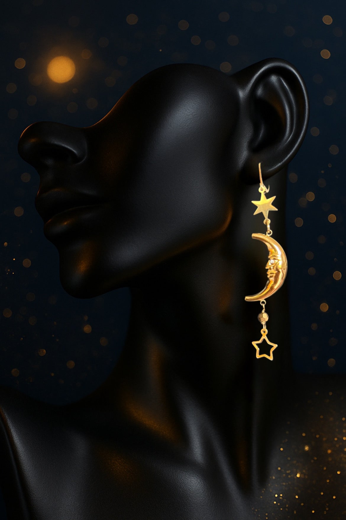 Mono orecchino in acciaio dorato