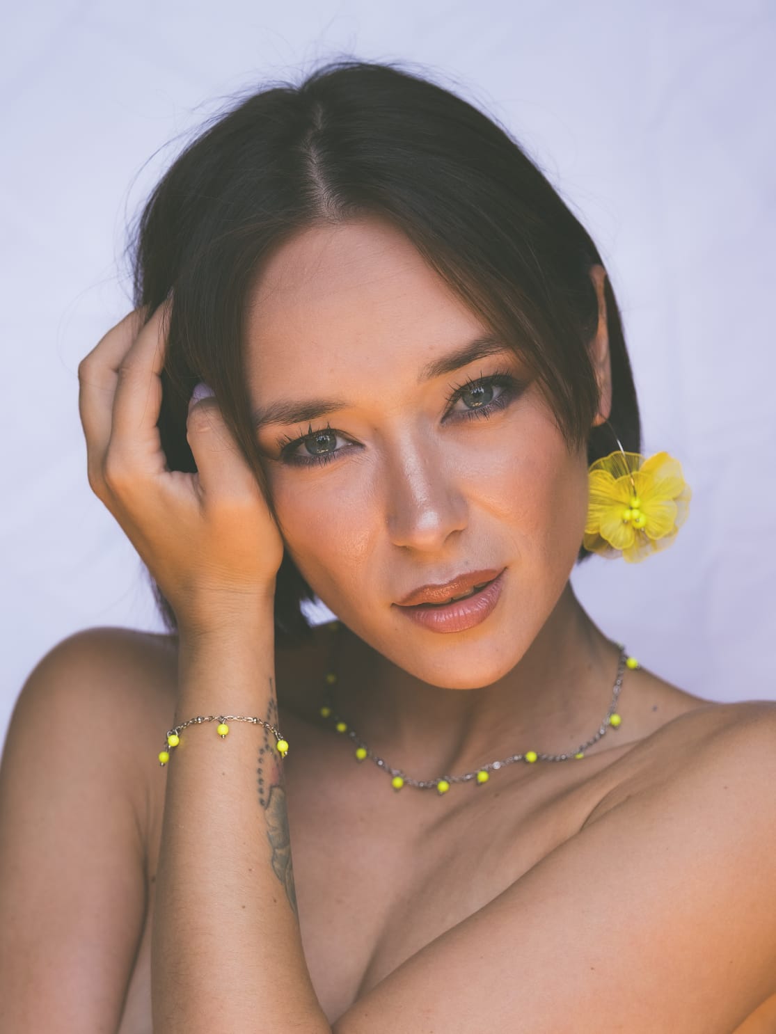 Mono orecchino, girocollo e bracciale  in acciaio e perle Swarovski 