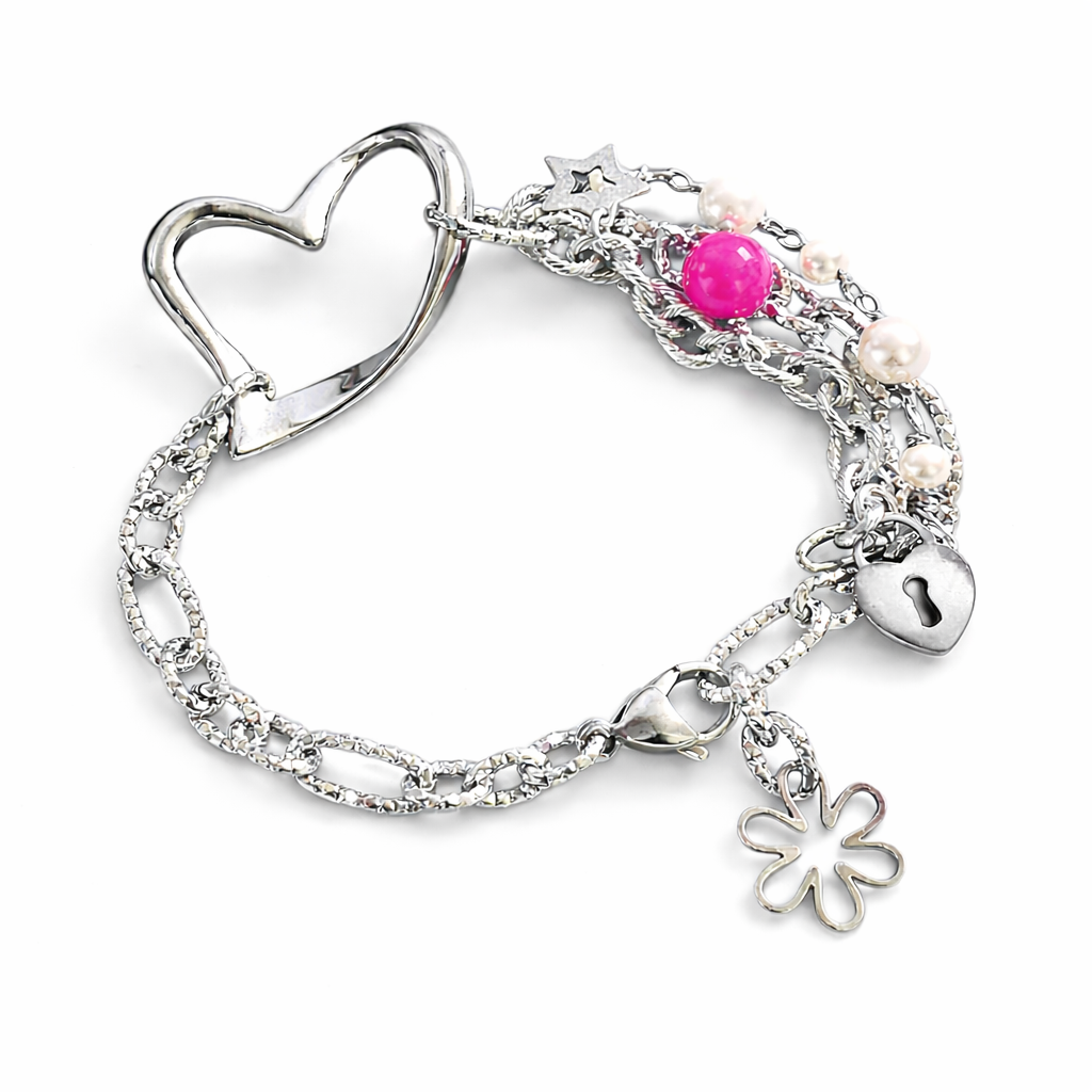 Bracciale in acciaio con perle di conchiglia  e corindone rubino  firmato Vizio Gioielli