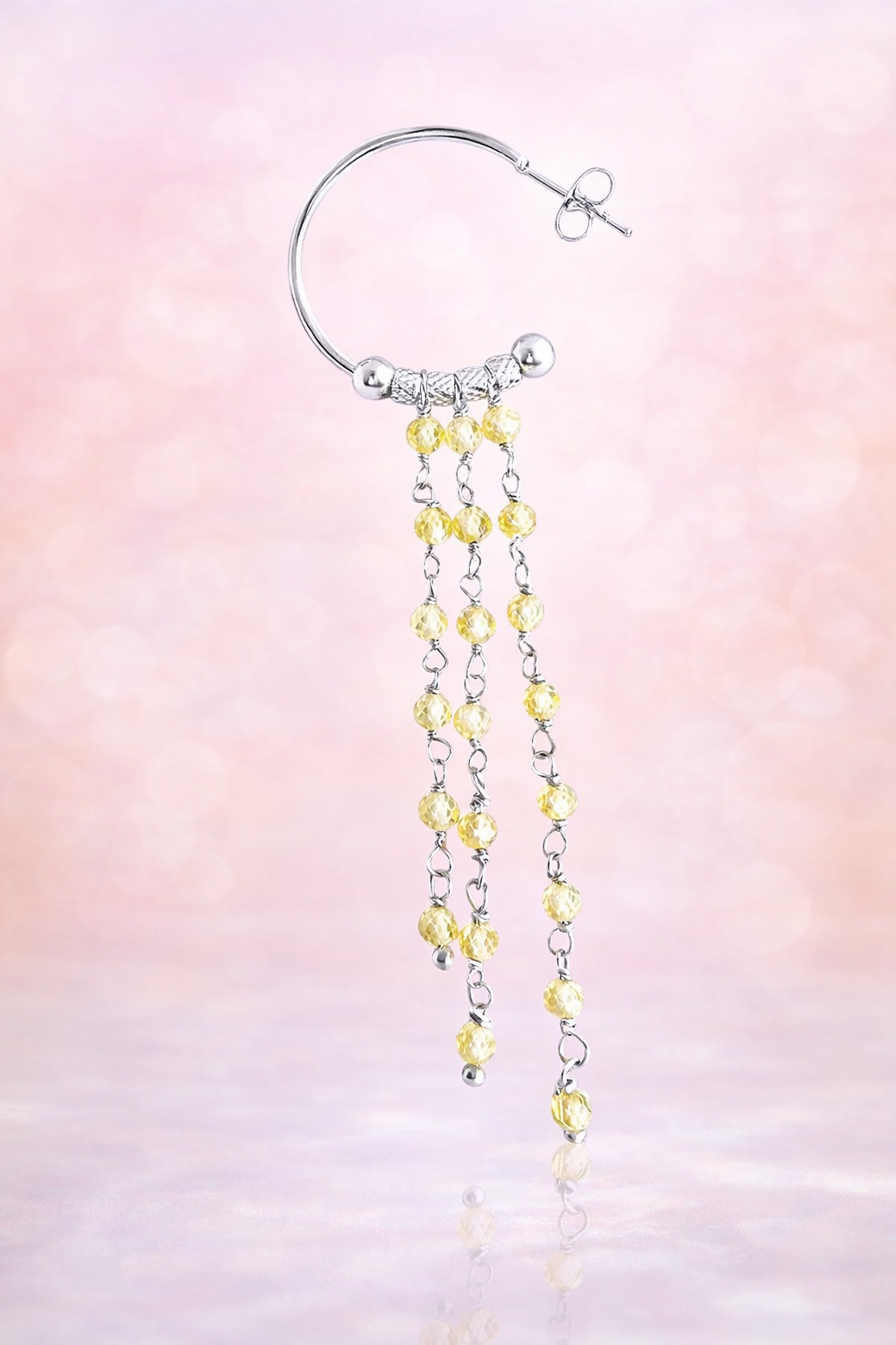 Mono orecchino in acciaio e zirconi gialli firmato Vizio Gioielli