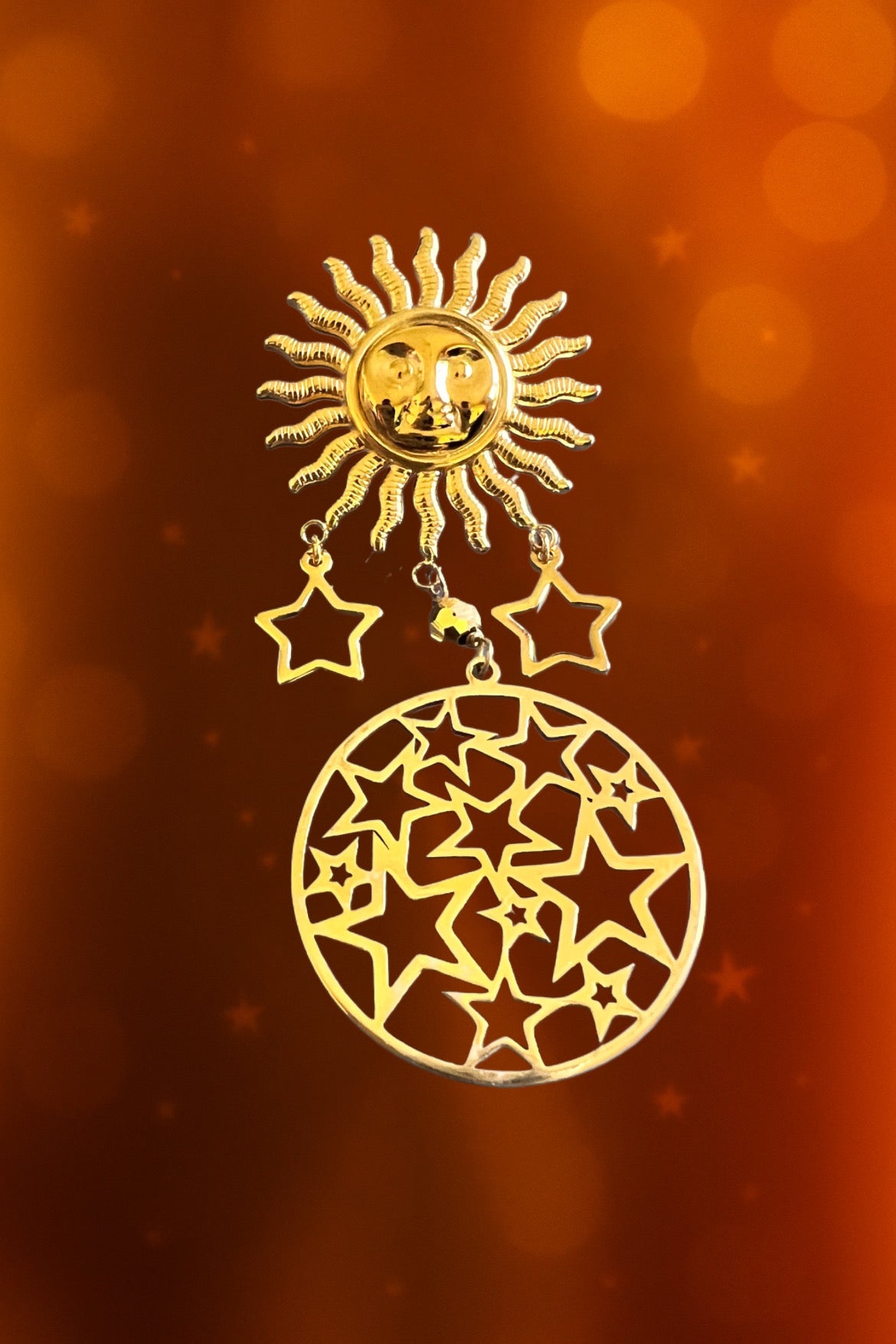 Mono orecchino in acciaio dorato