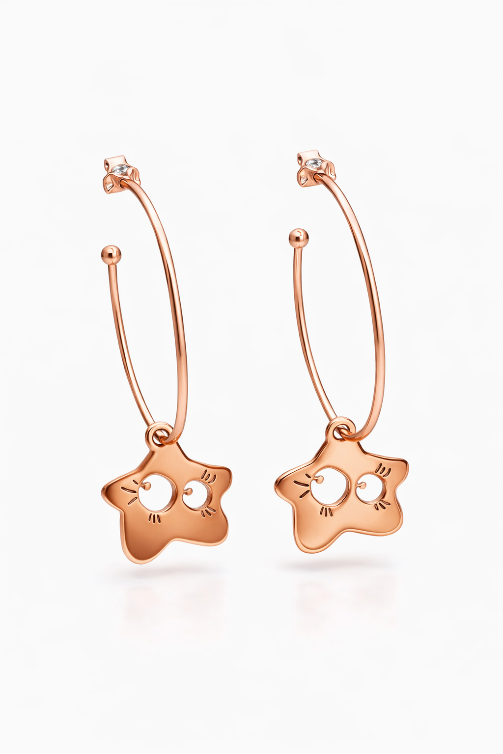 Orecchini ad anella con perno in argento 925, arricchiti da un pendente stella  in acciaio rosato firmati Vizio Gioielli