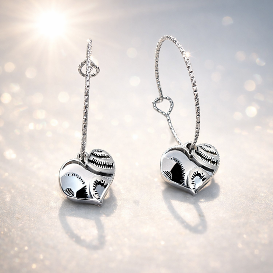 Orecchini in acciaio con pendente cuore firmati Vizio Gioielli