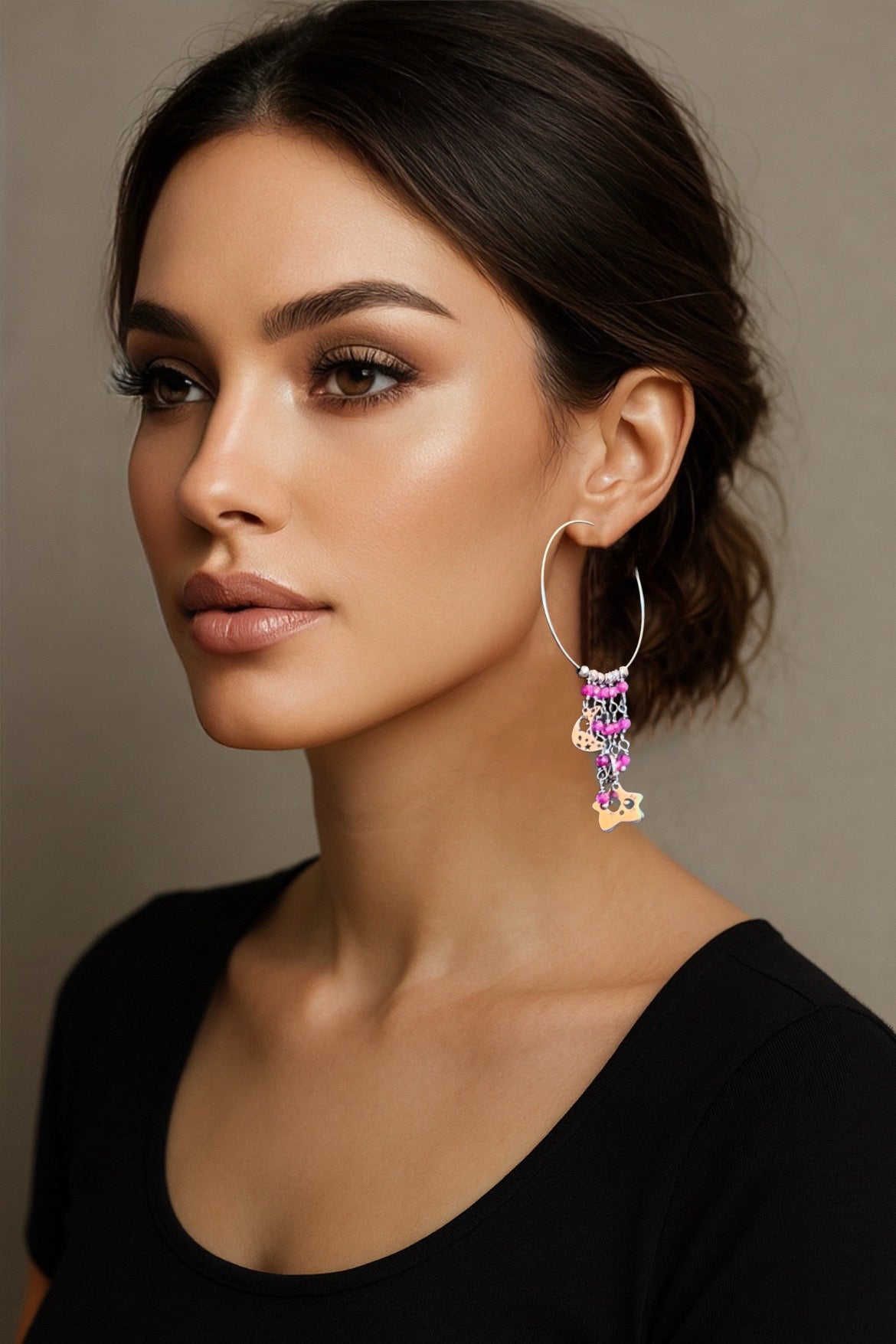 Mono orecchino in acciaio e zirconi