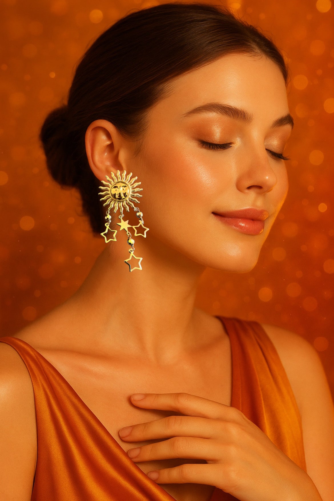 Mono orecchino in acciaio dorato