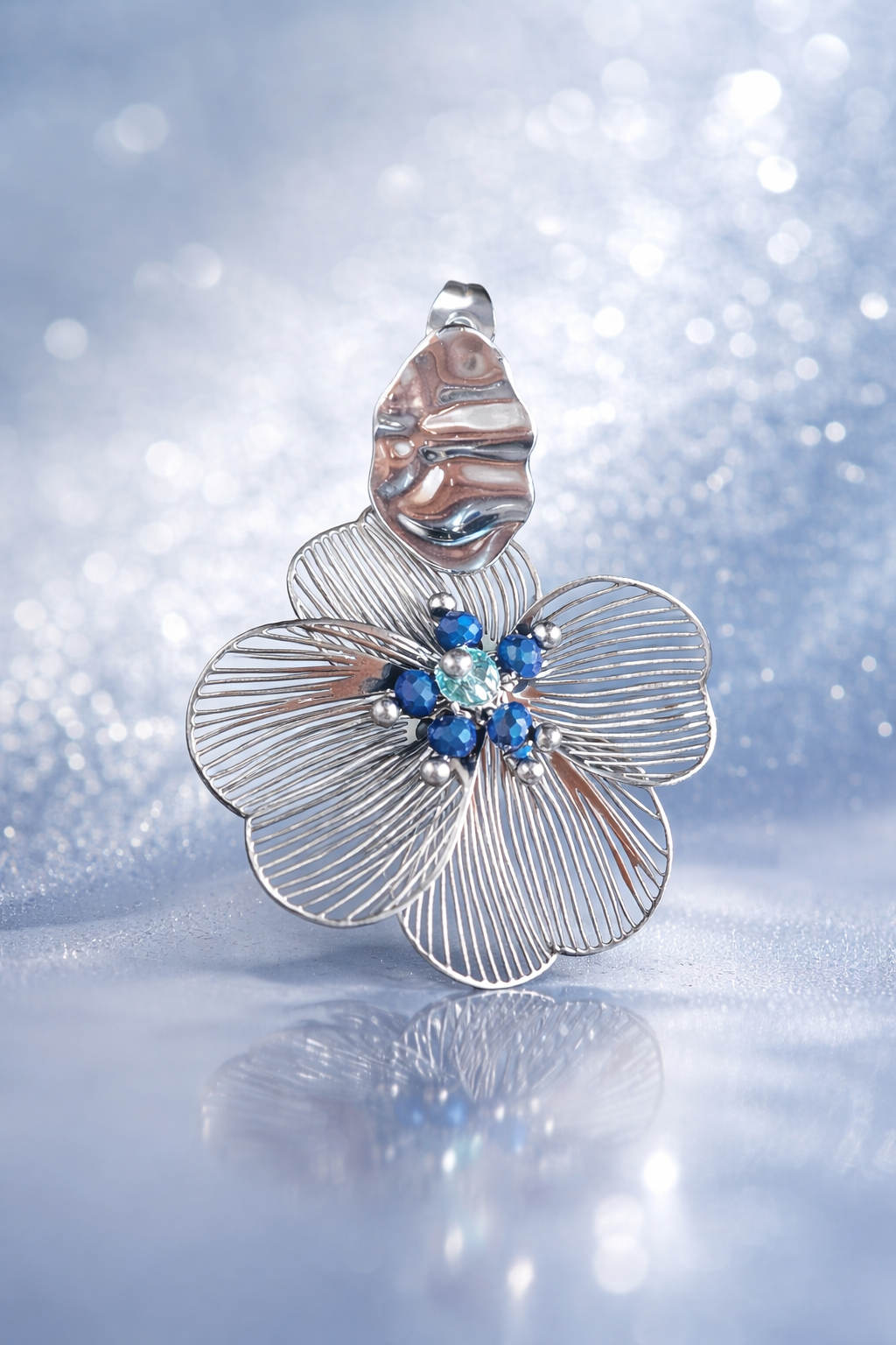 Mono Orecchino Fiore in Acciaio con Cristalli blu firmato Vizio Gioielli