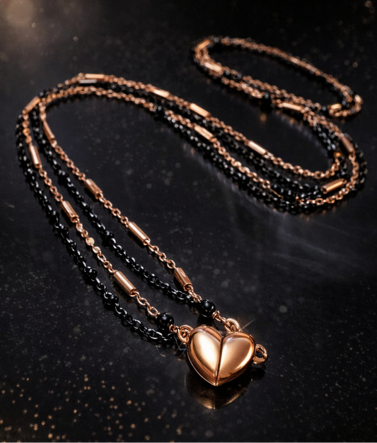 Collana cuore magnetico in acciaio rosato e nero firmata Vizio Gioielli