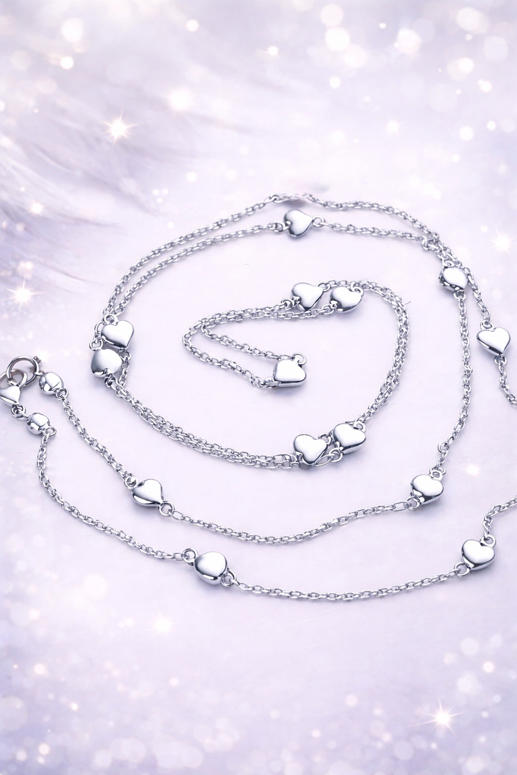 Collana lunga  in acciaio cuoricini firmata Vizio Gioielli