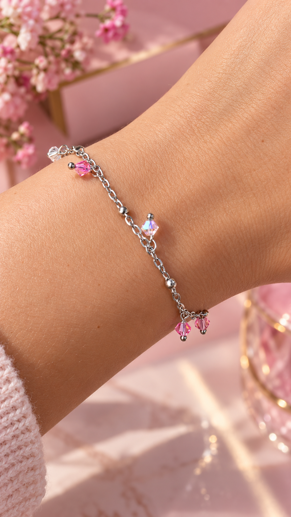 Bracciale California Sunrise in acciaio lucido con cristalli rosa pesca e trasparenti
