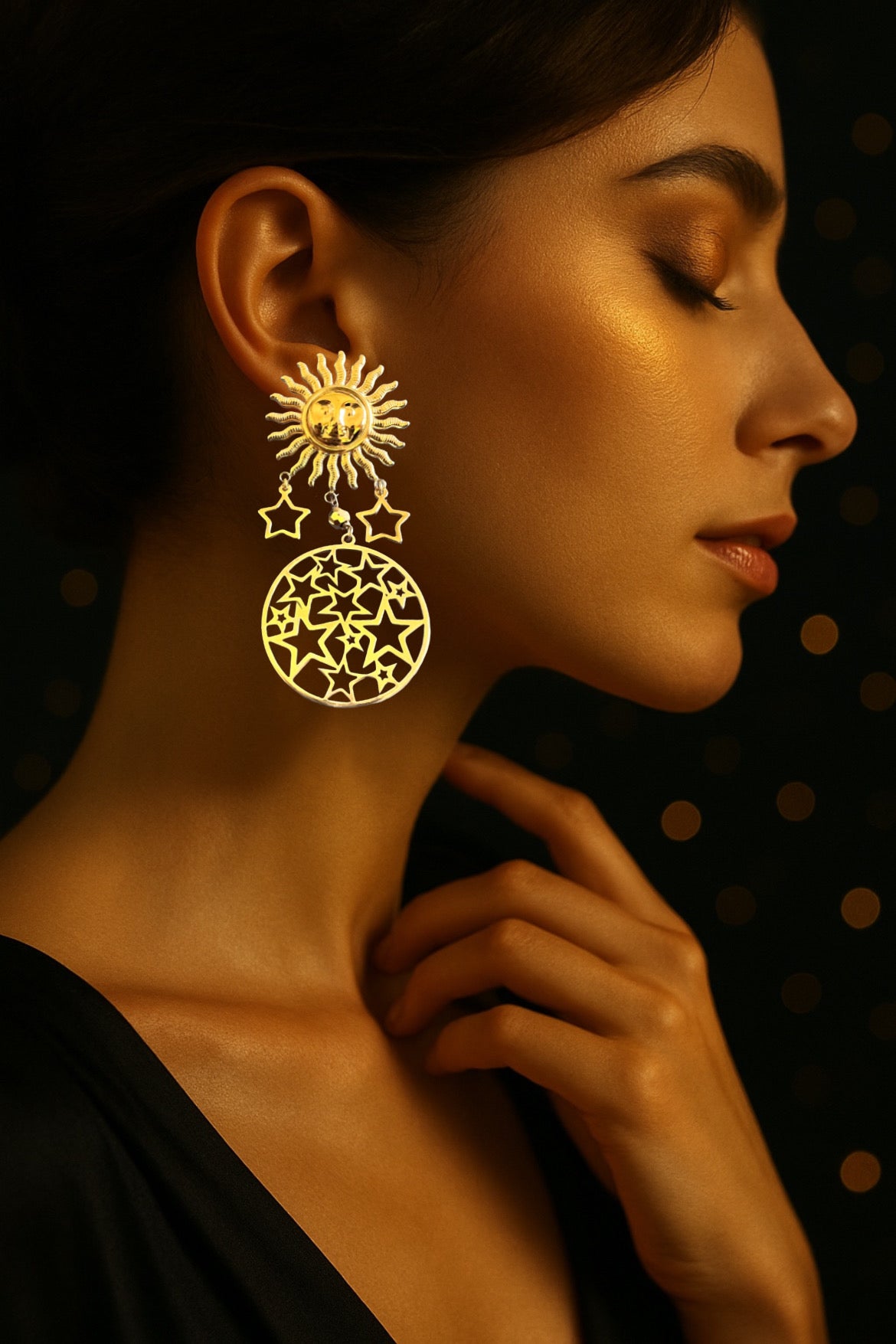 Mono orecchino in acciaio dorato