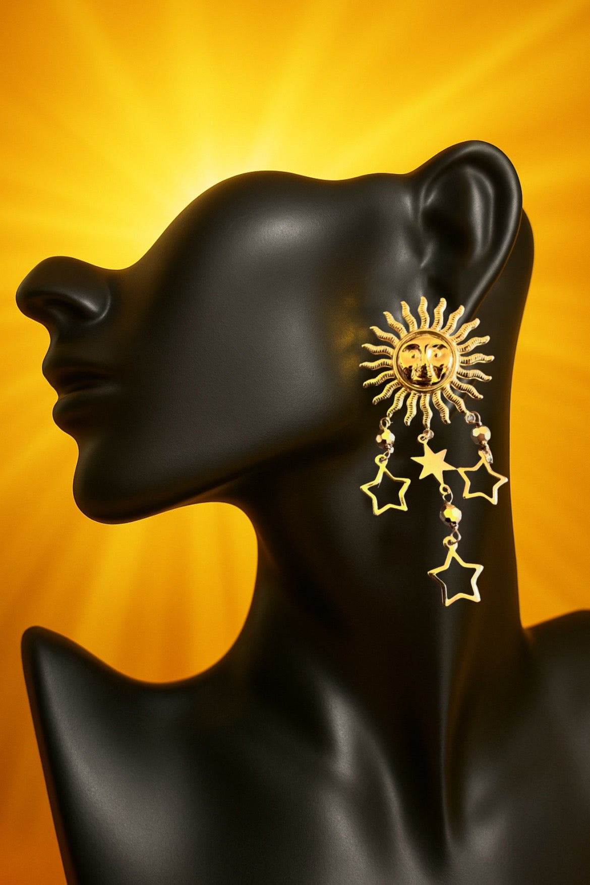 Mono orecchino in acciaio dorato