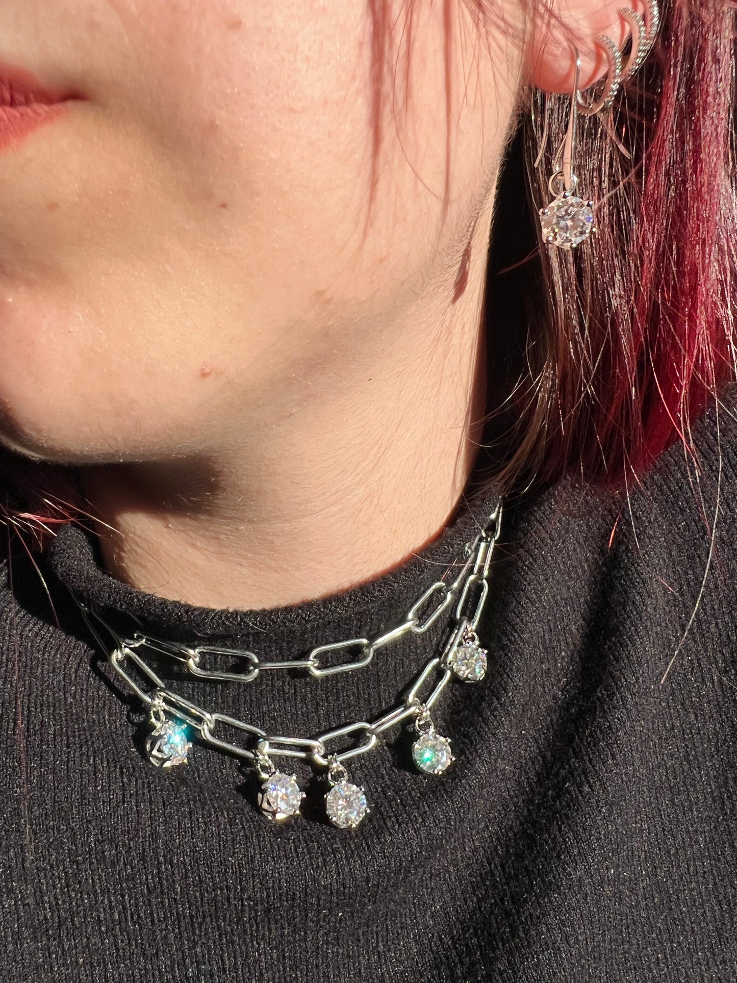 Girocollo e orecchini in acciaio e Moissanite 