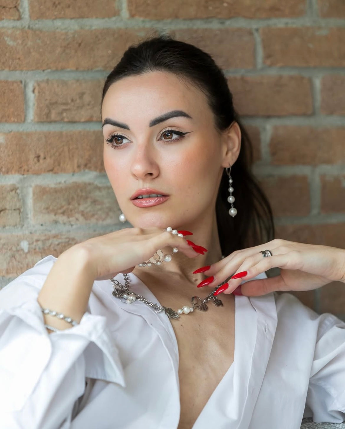 Orecchini in acciaio e perle di madreperla