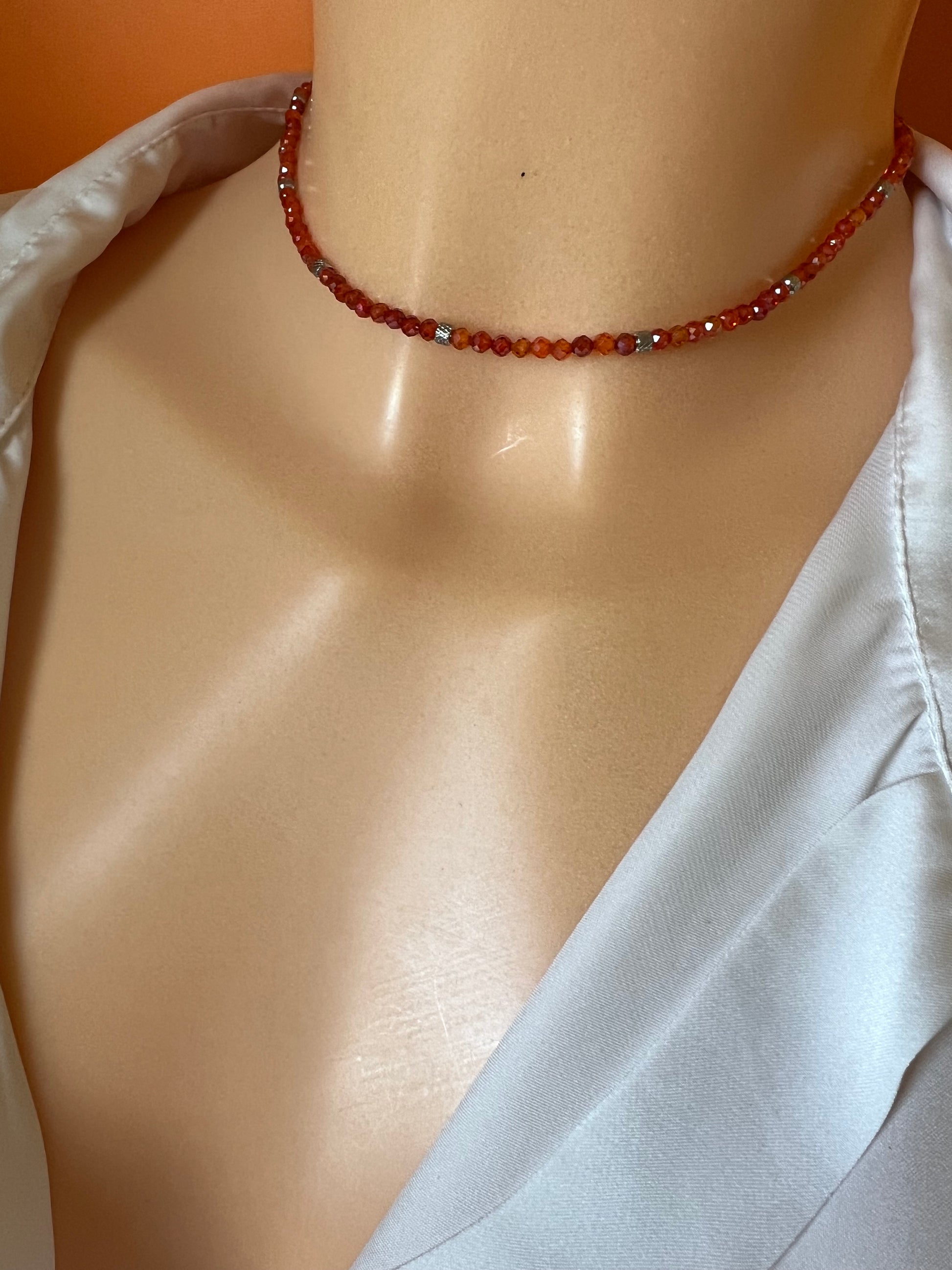 Girocollo in acciaio e zirconi arancioni