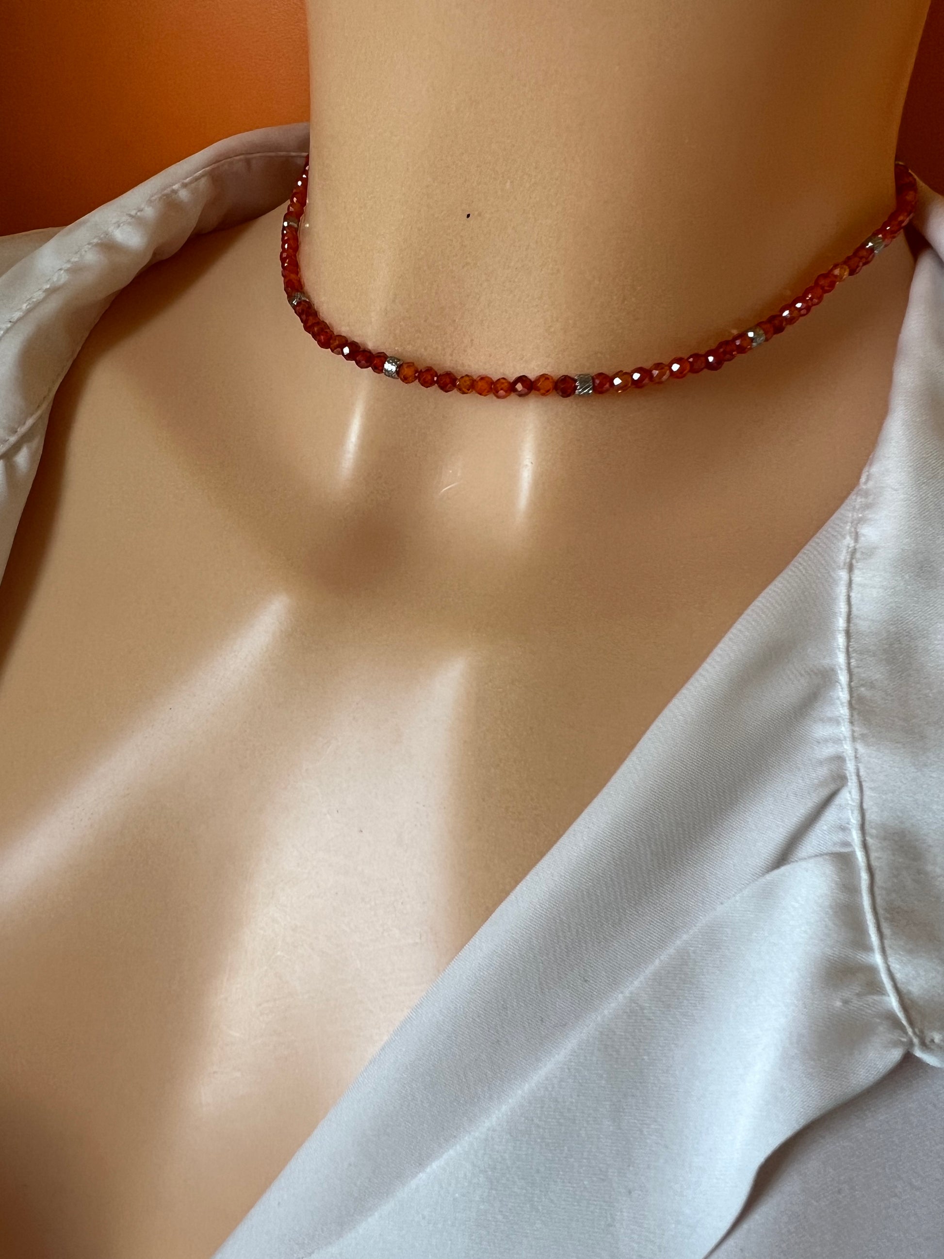 Girocollo in acciaio e zirconi arancioni