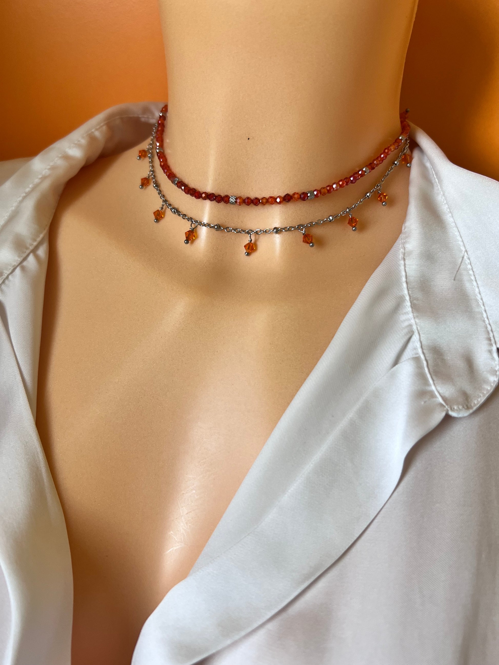 Girocollo in acciaio e zirconi arancioni
