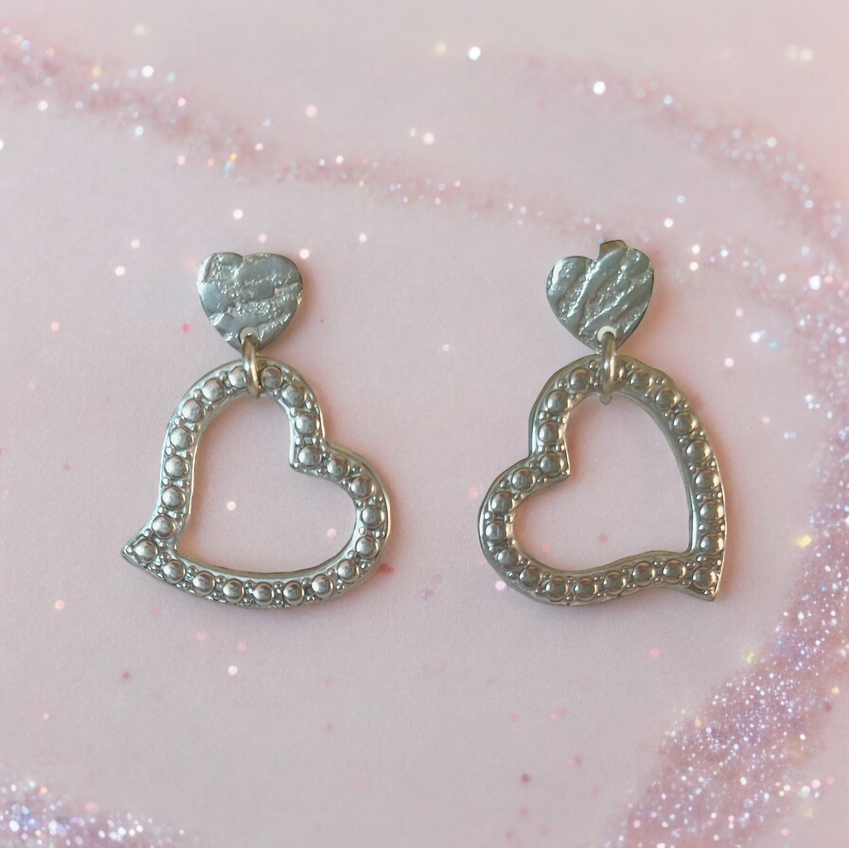 Orecchini in acciaio colore argento cuore grande