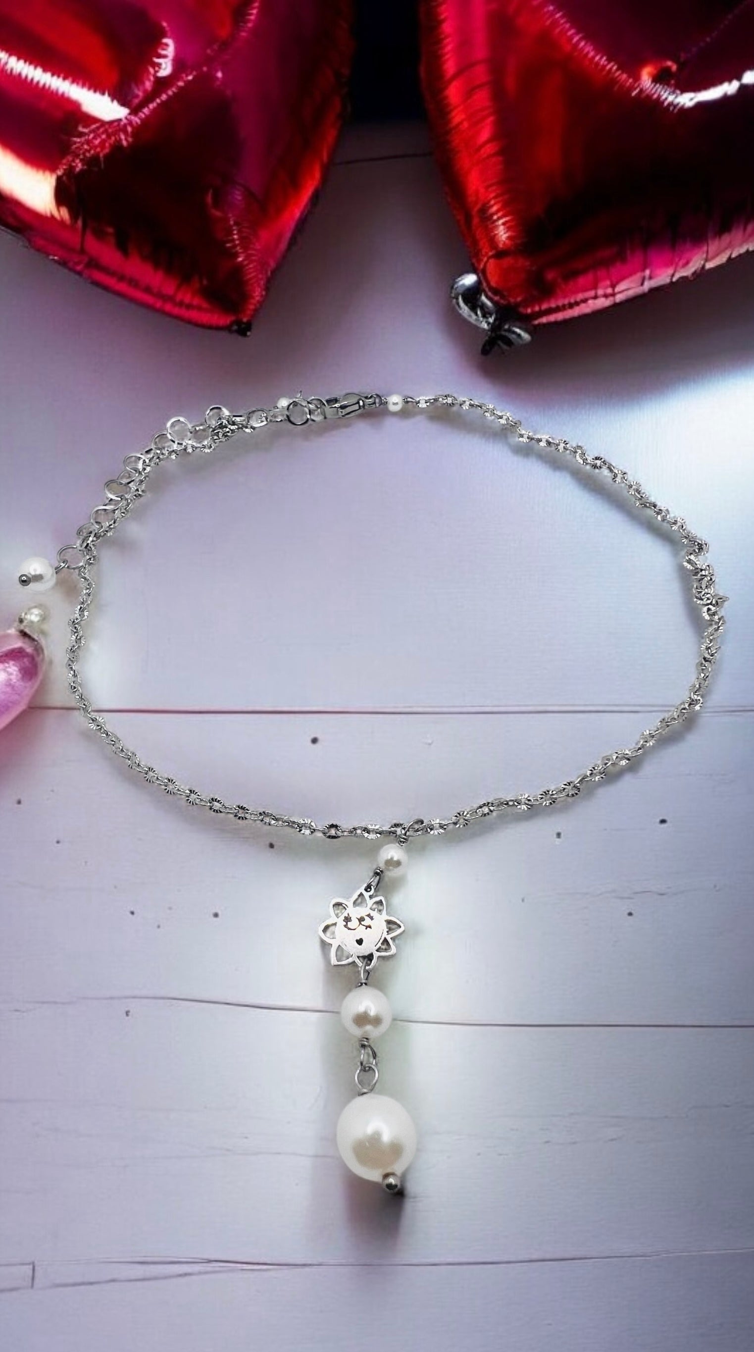 Girocollo in acciaio e perle di conchiglia