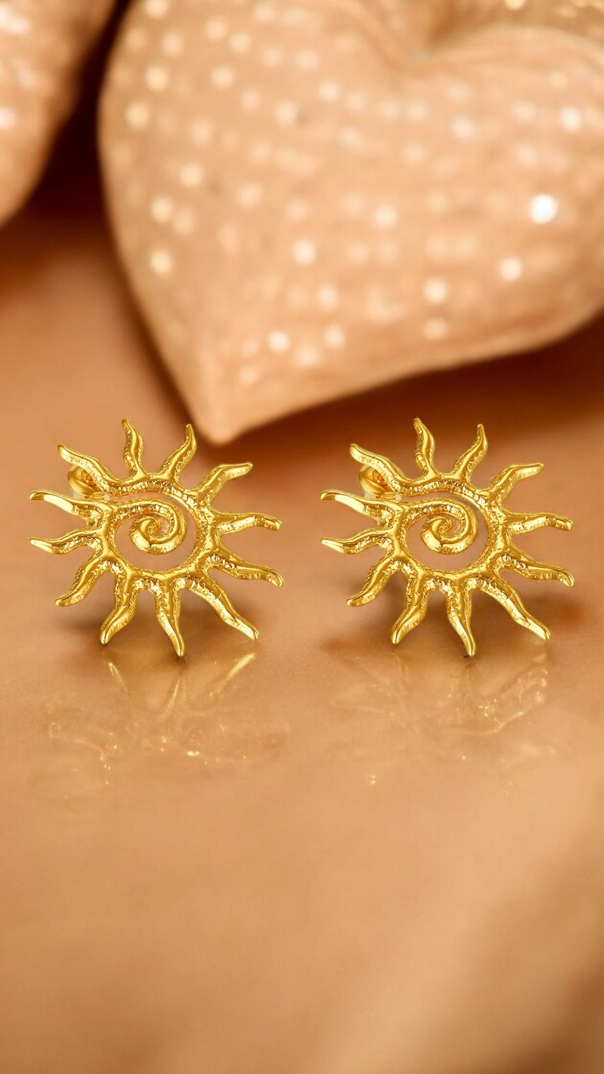 Orecchini  in acciaio dorato Sole