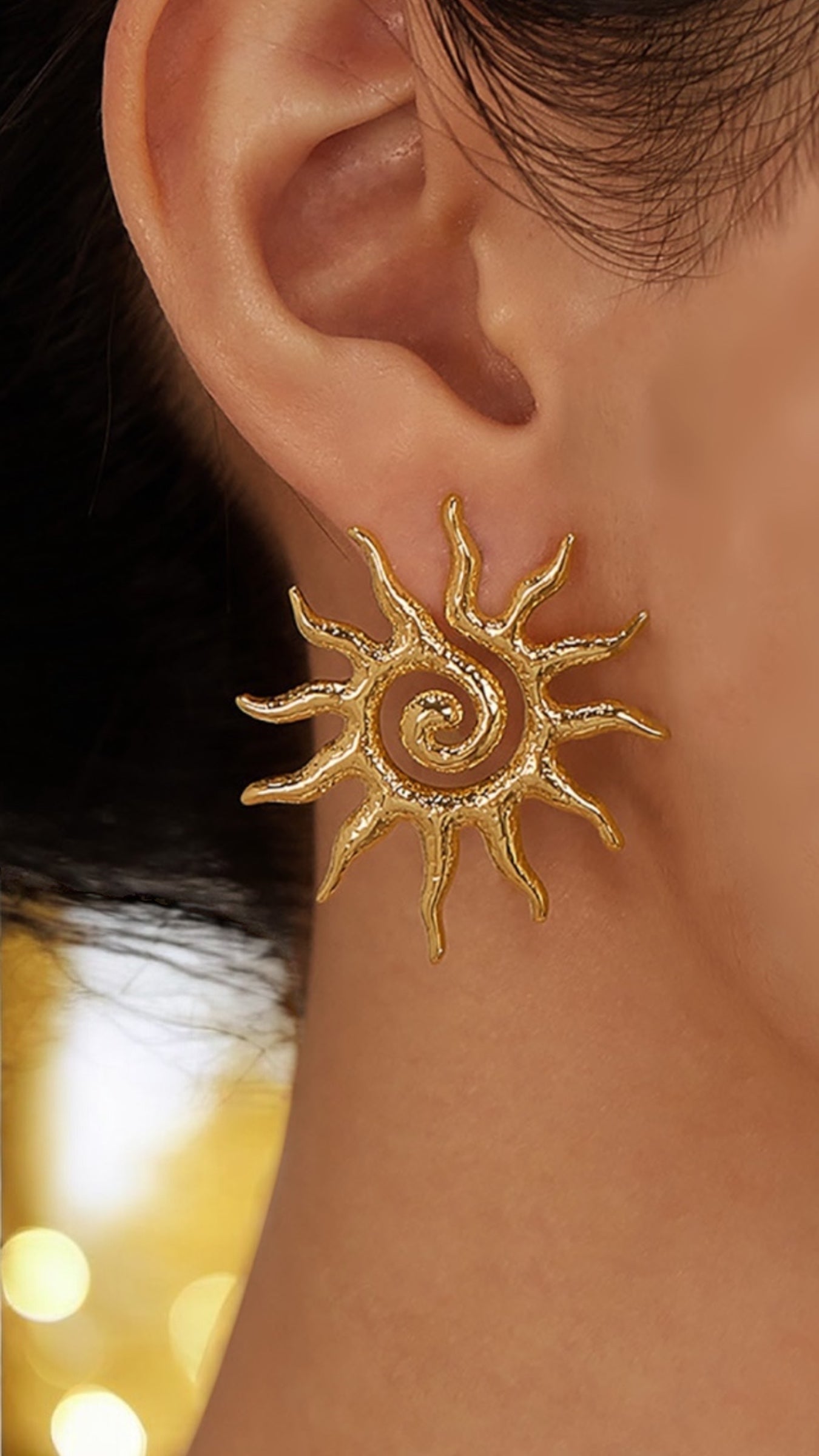 Orecchini  in acciaio dorato Sole