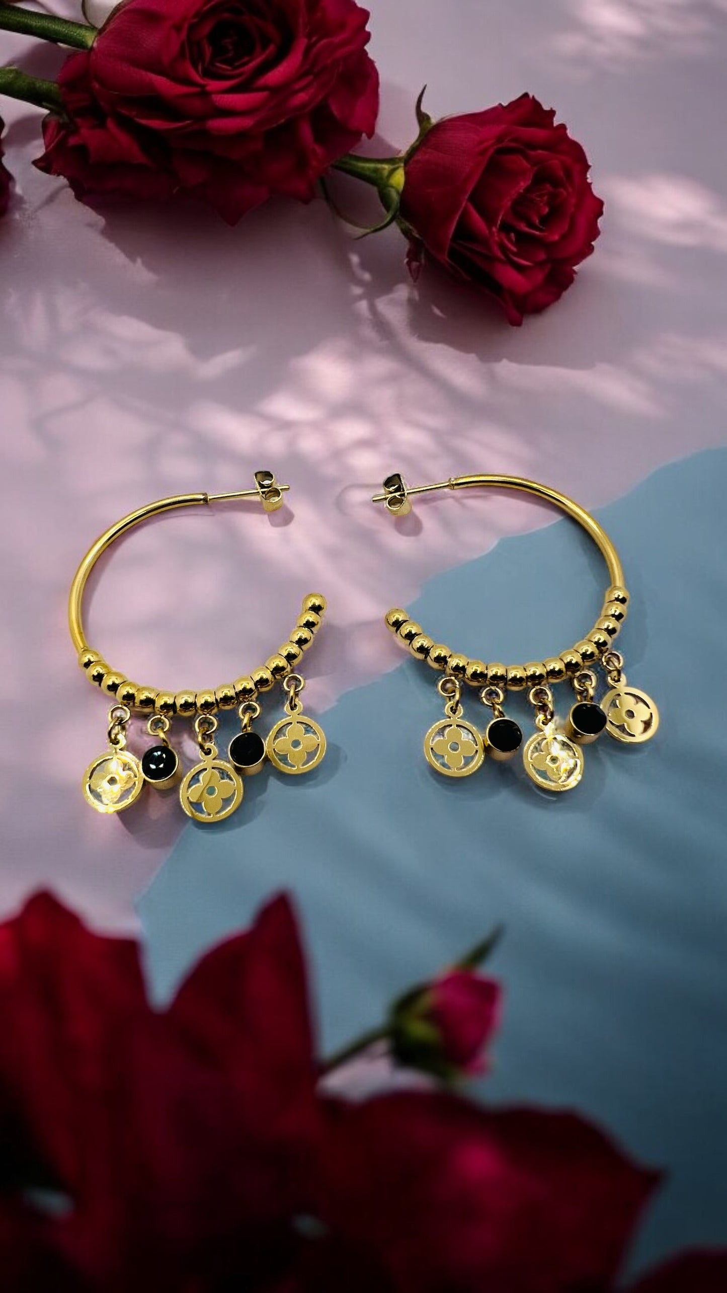 Orecchini  in acciaio dorato con pendenti