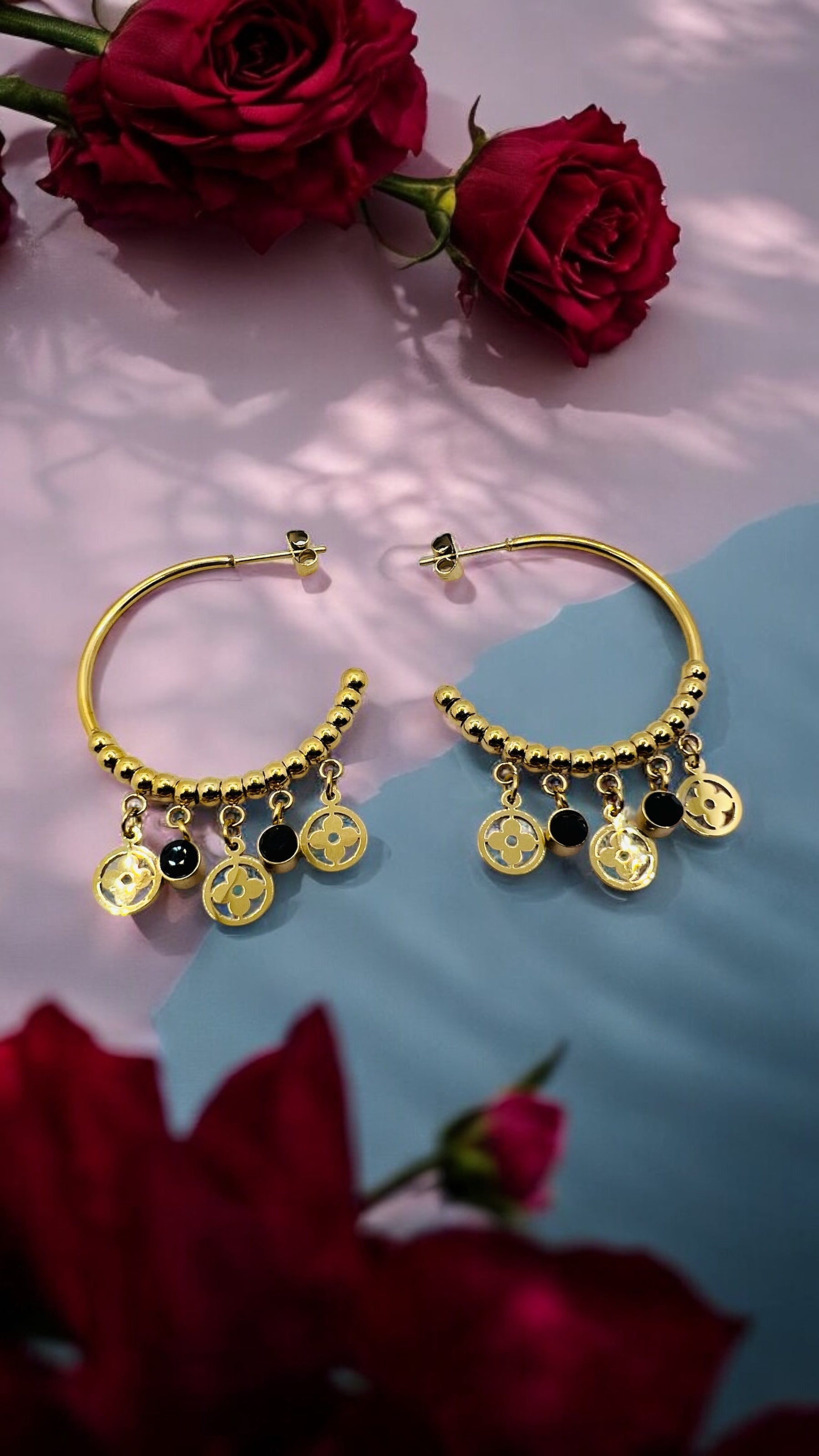 Orecchini  in acciaio dorato con pendenti