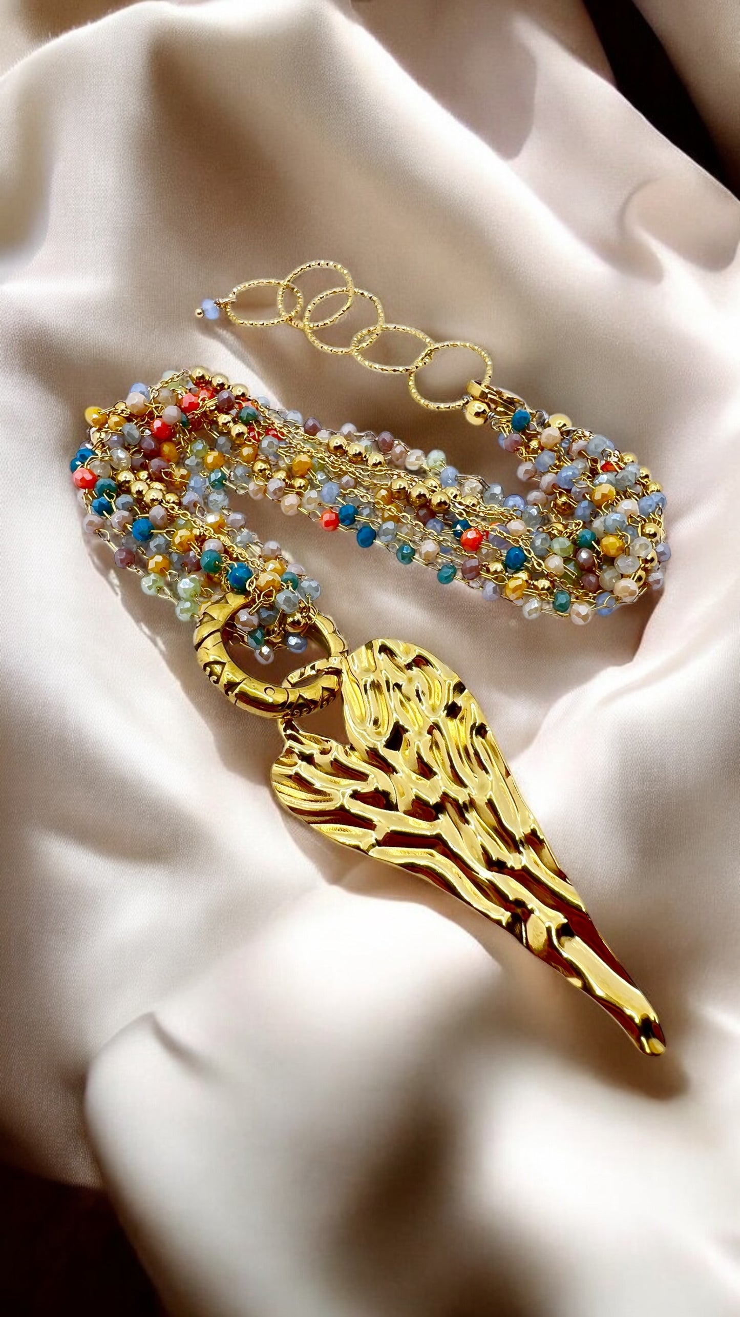 Girocollo multifilo in acciaio e cristalli con pendente cuore