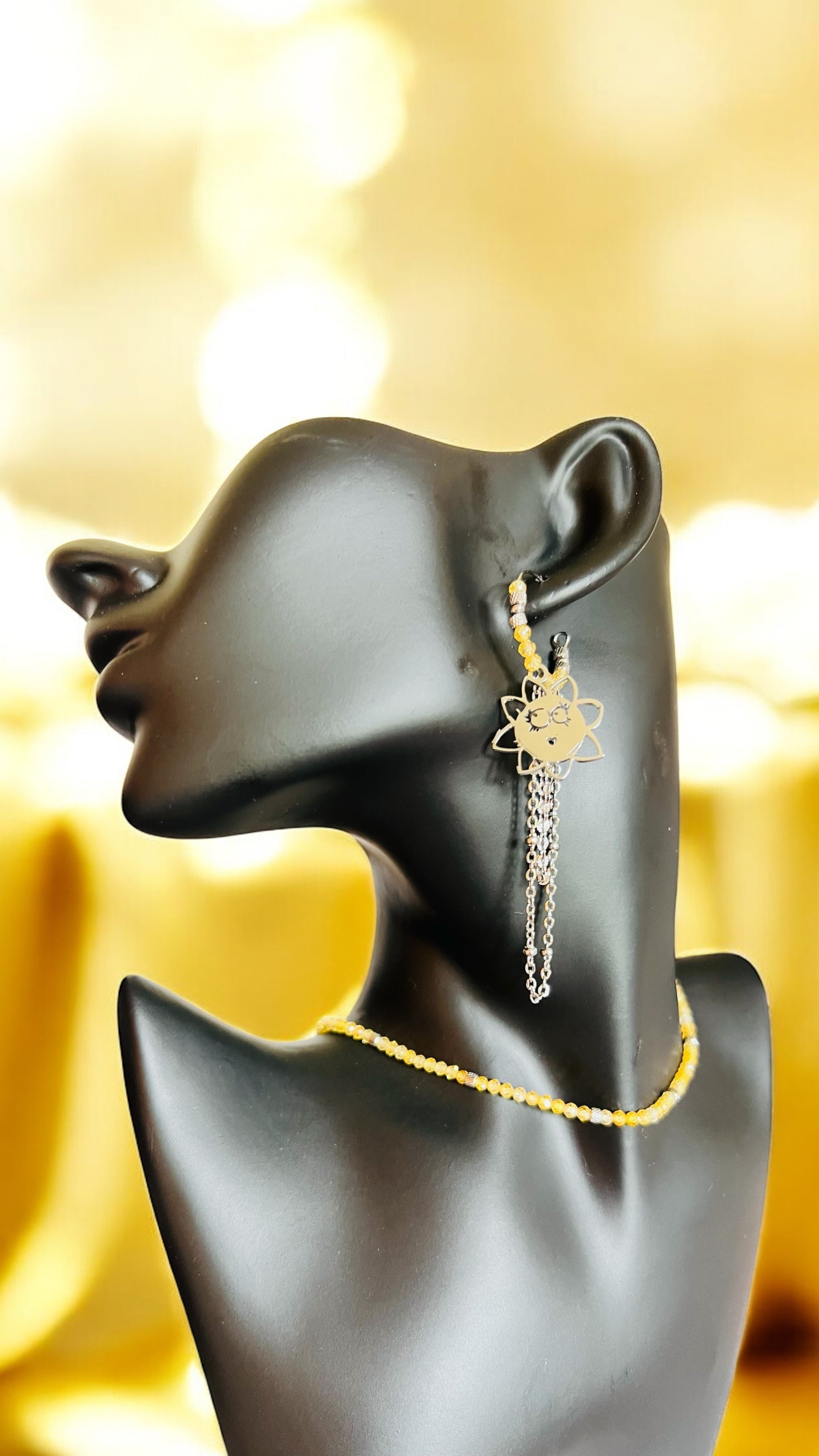 Mono orecchino in acciaio e zirconi