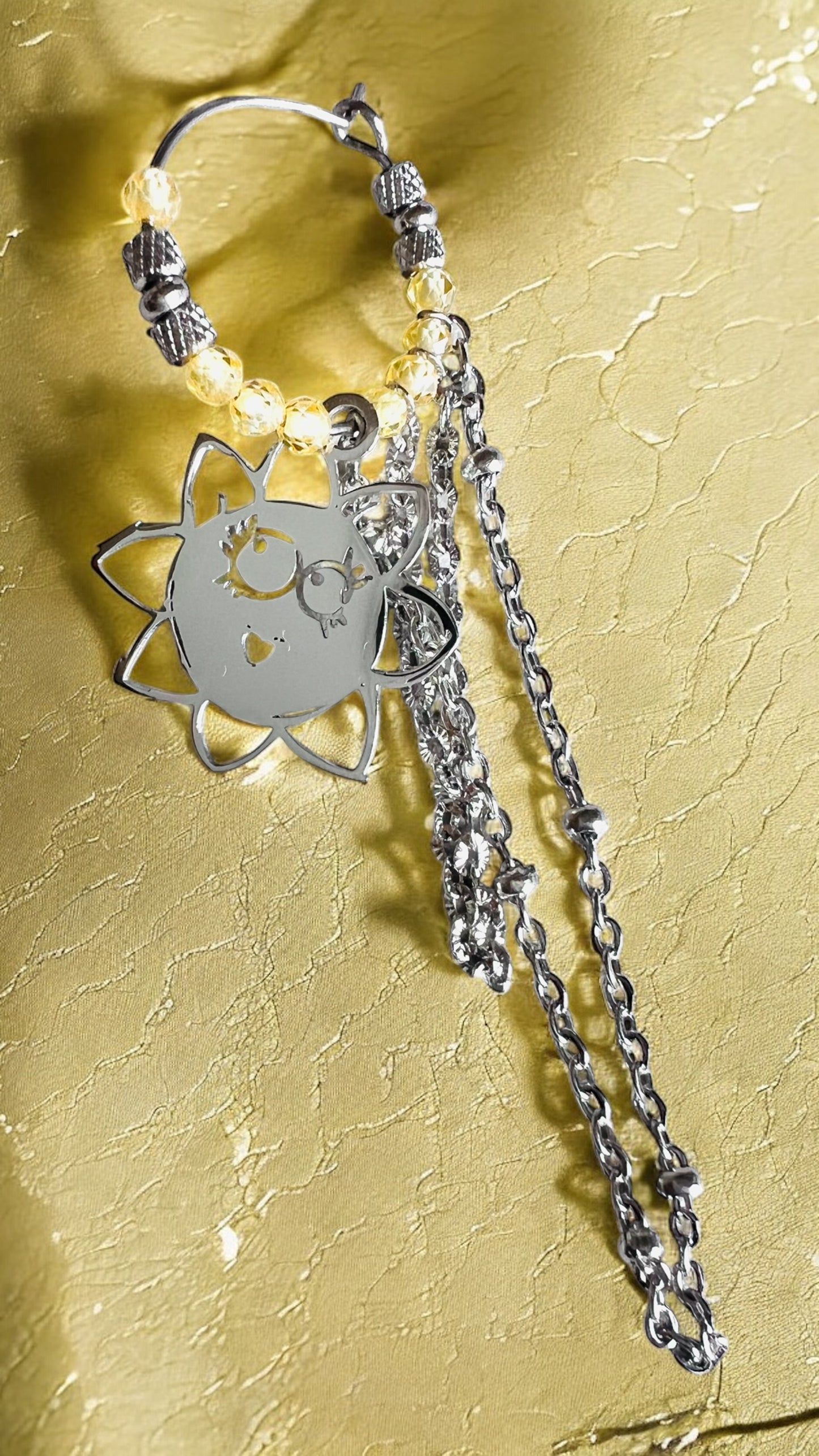 Mono orecchino in acciaio e zirconi