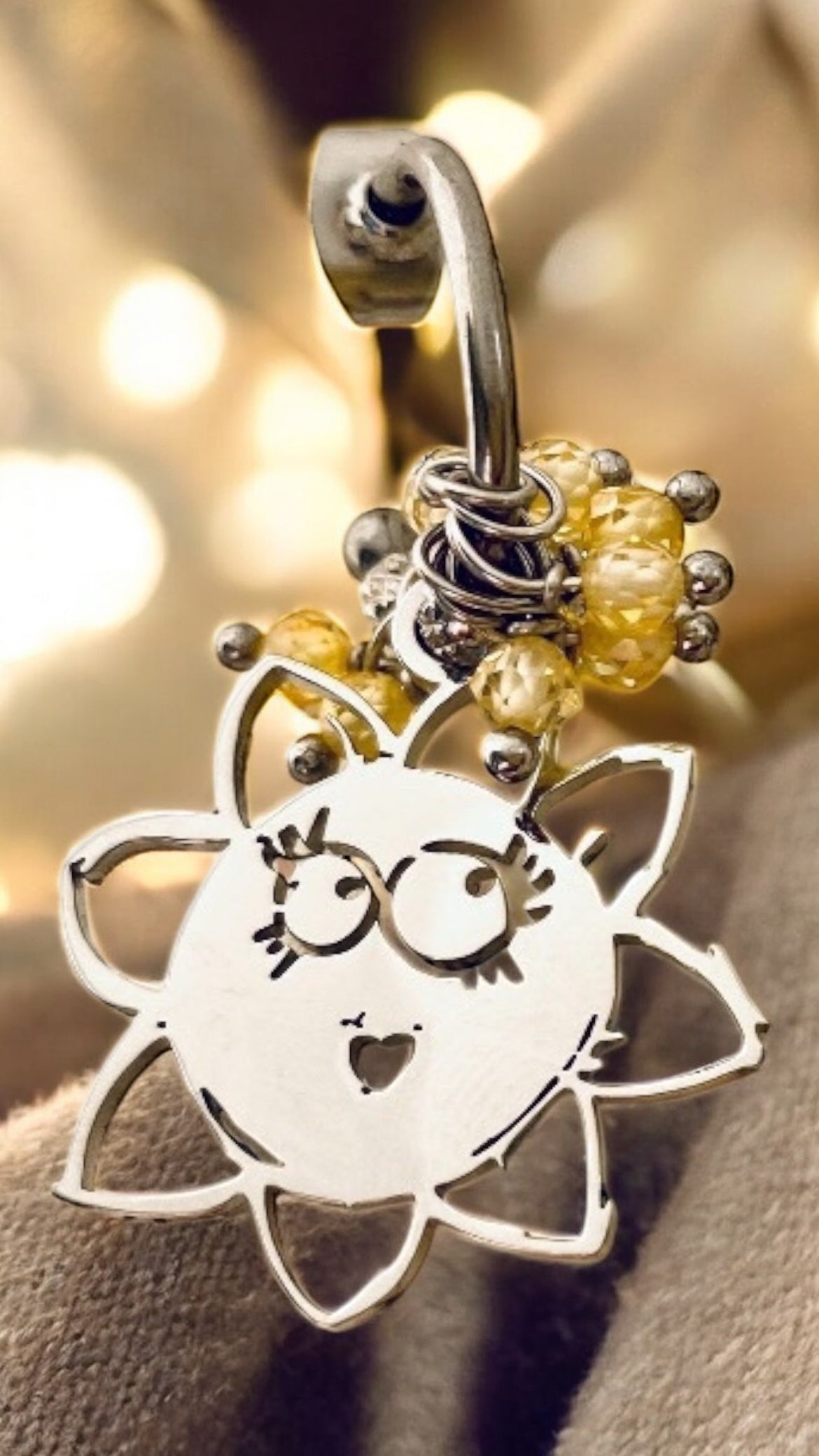 Mono orecchino in acciaio e zirconi